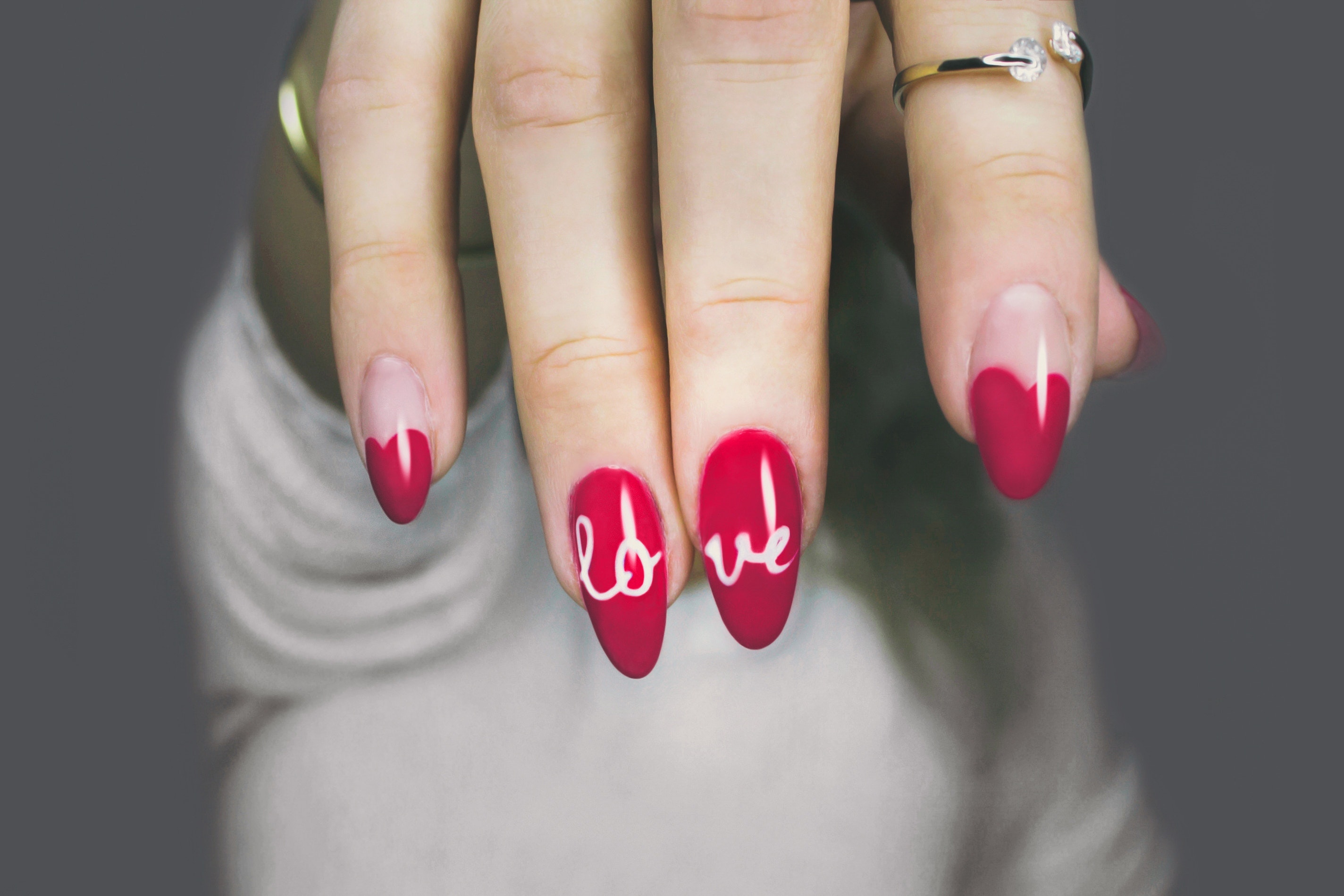 An image of a hand with stylish nail polish. | Source: Pexels