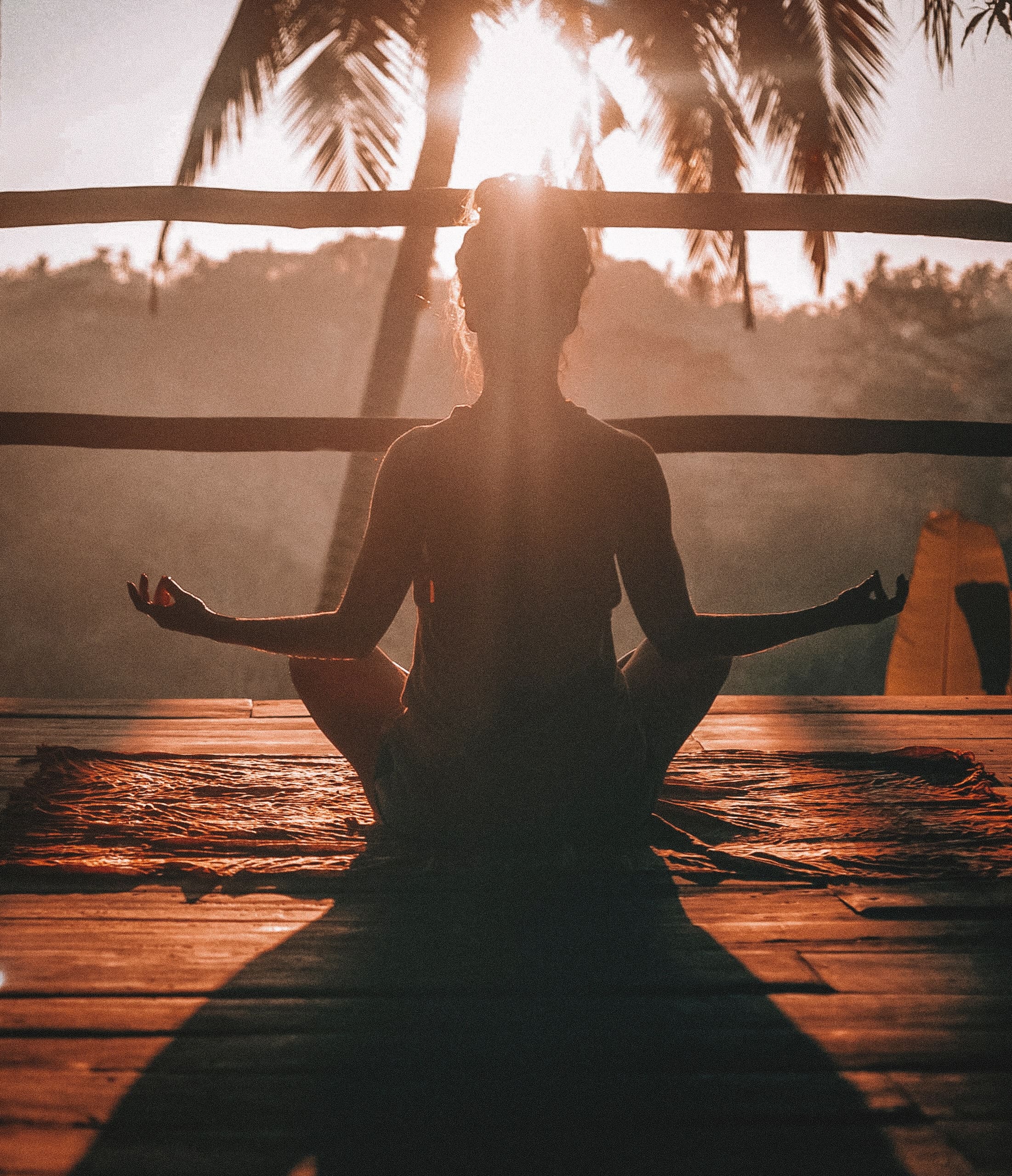 Woman meditating | Unsplash 