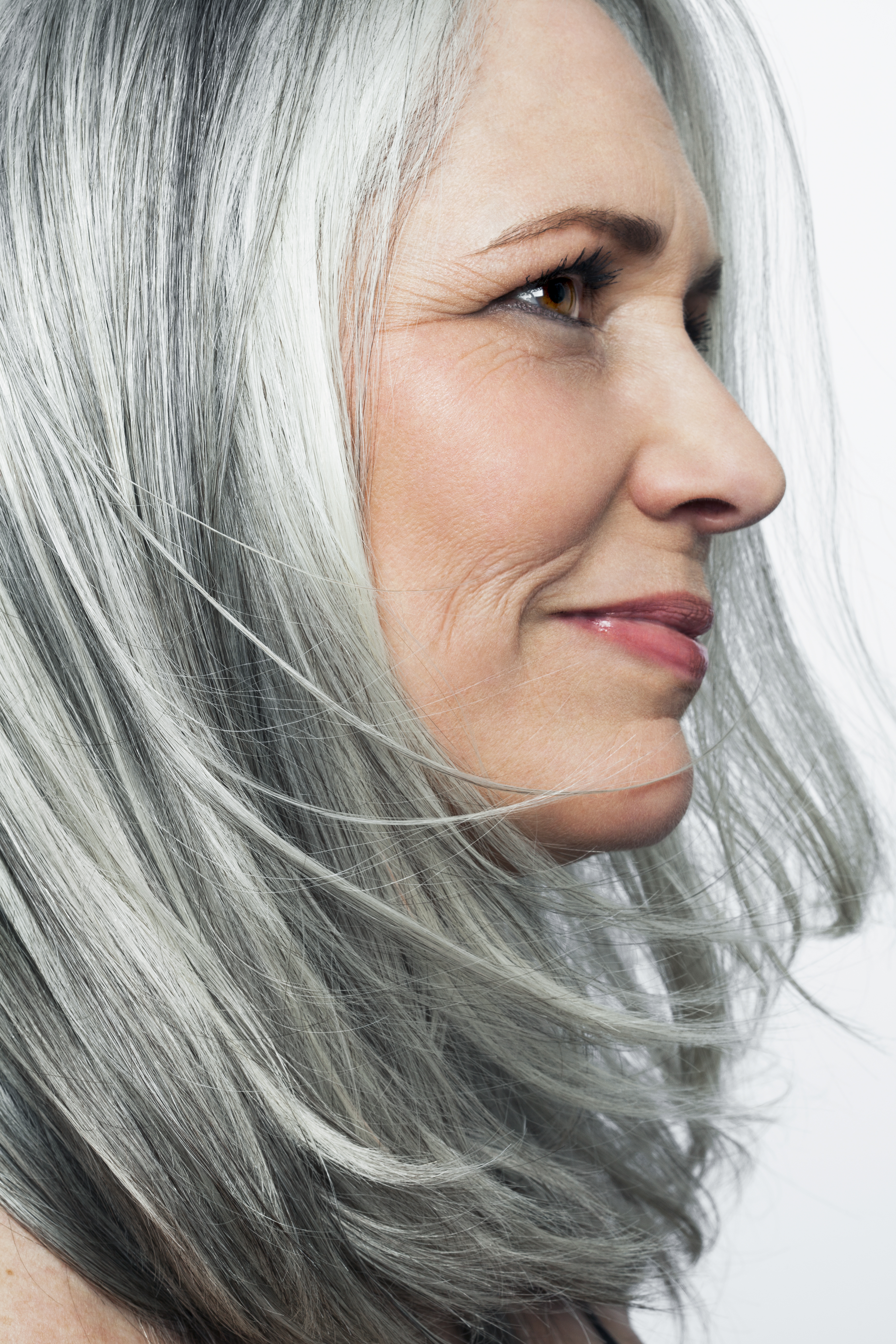 Woman with grey hair in a C-cut. | Source: Getty Images