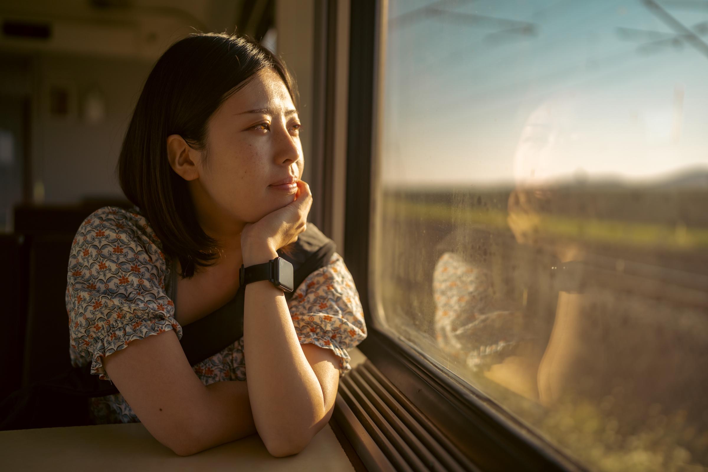 Woman travelling by train | Source: Getty Images