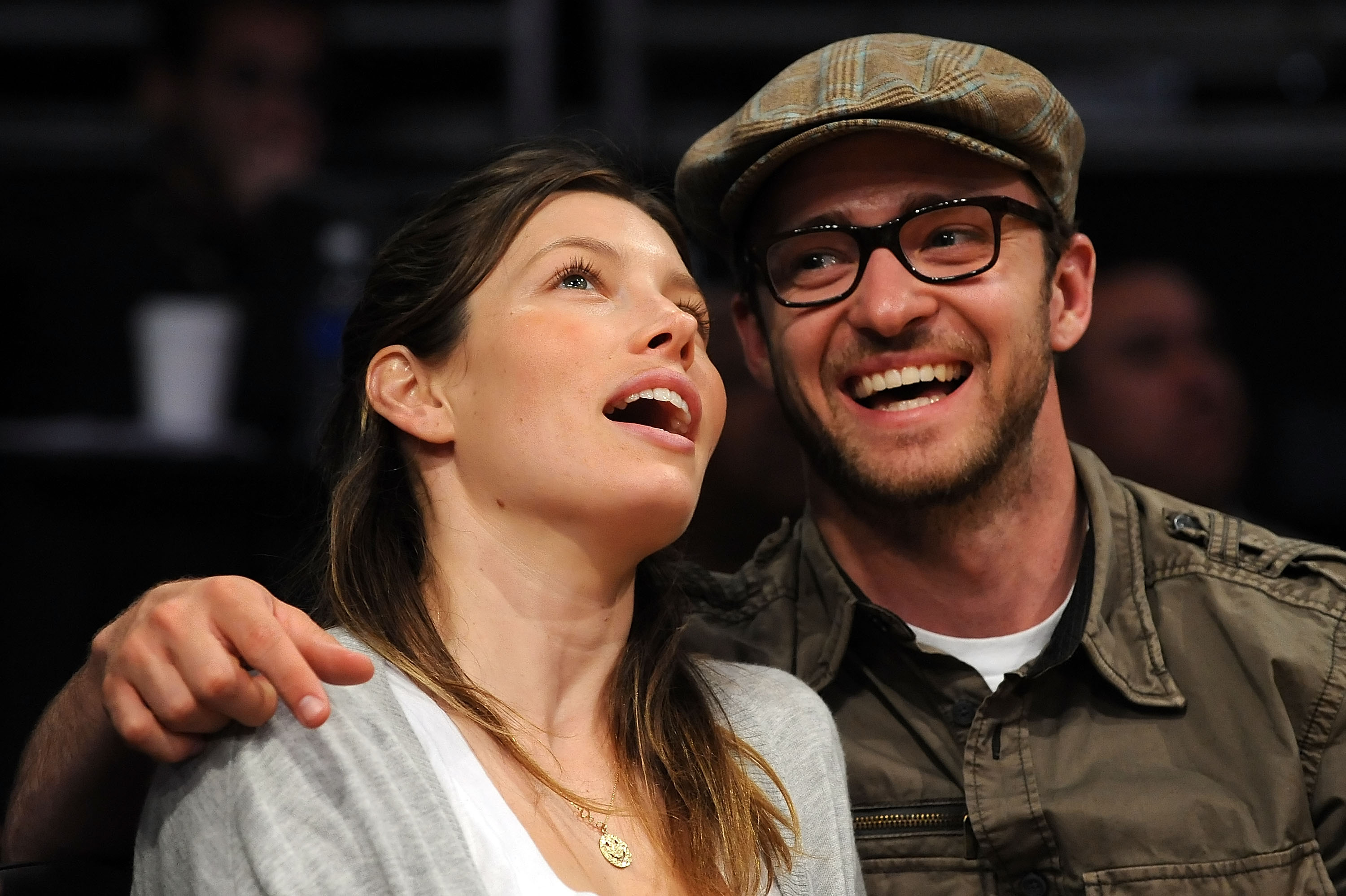 Jessica Biel and Justin Timberlake smile together from their courtside seats during a Los Angeles Lakers game against the Utah Jazz. | Source: Getty Images