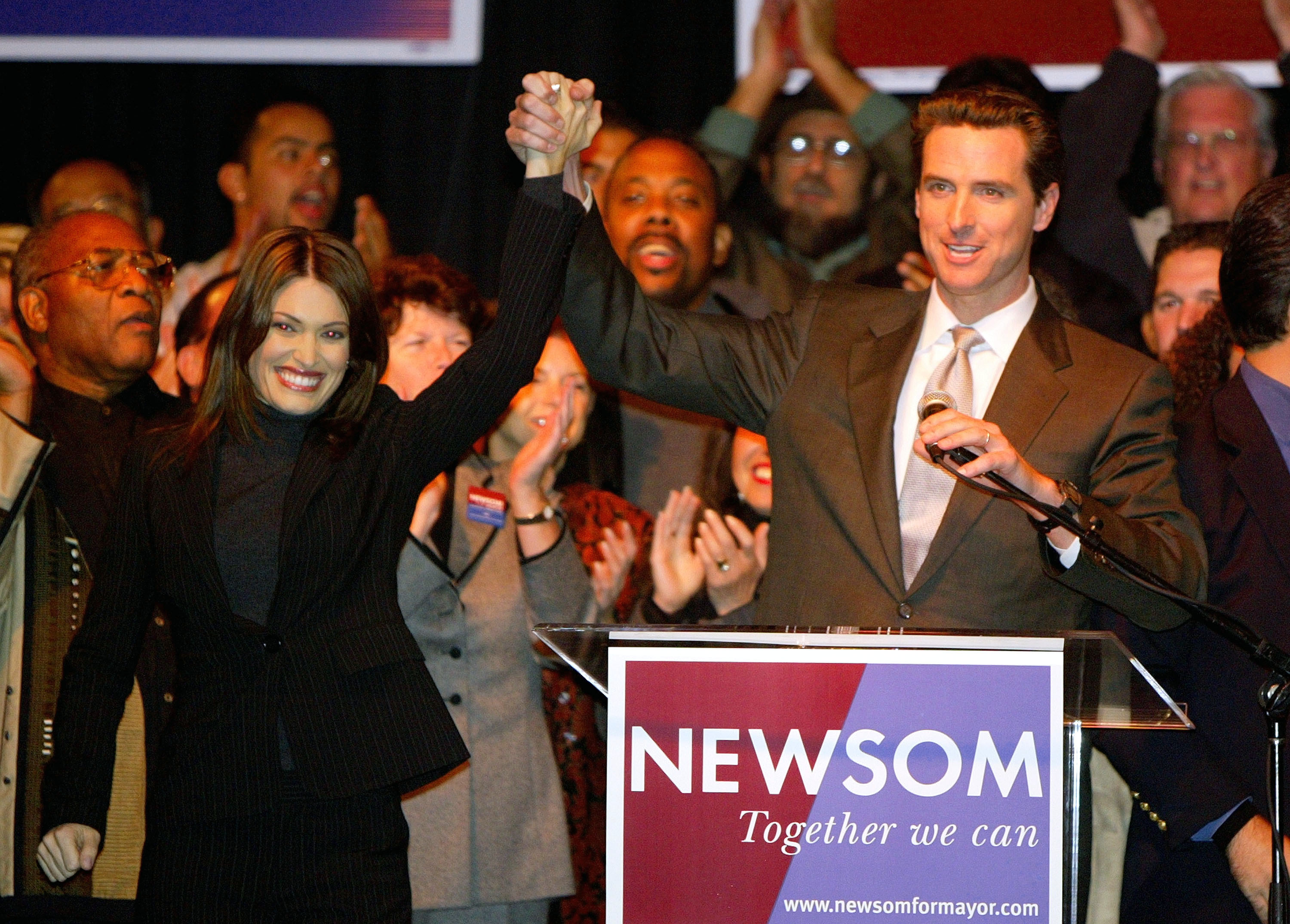 Kimberly Guilfoyle joins then-husband Gavin Newsom during his election night celebration in San Francisco on November 4, 2003 | Source: Getty Images