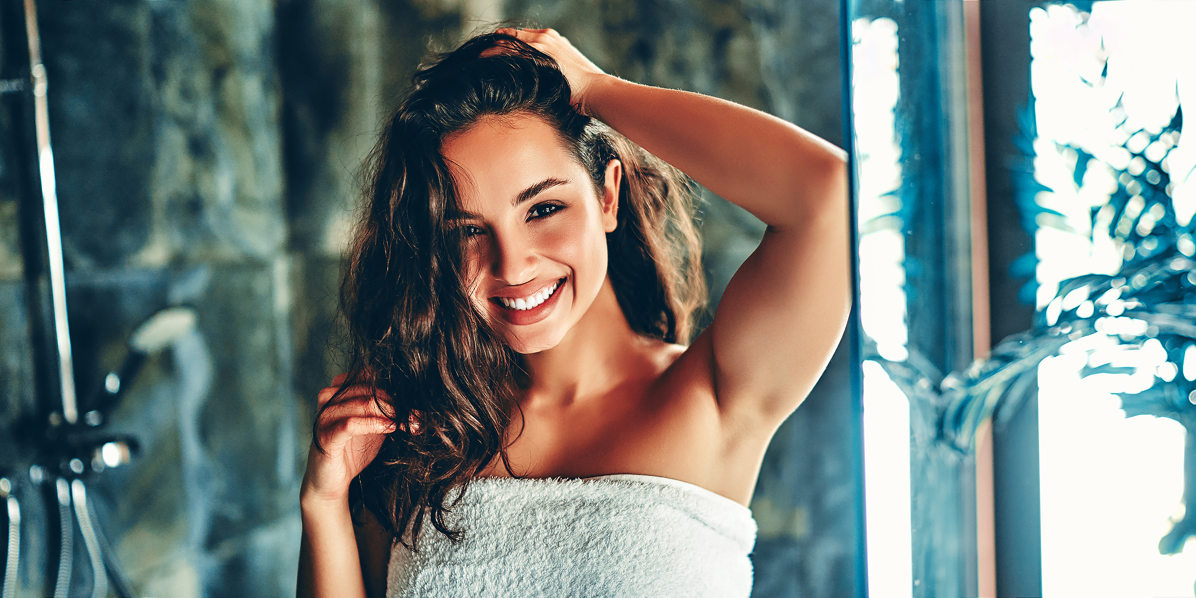 Woman in a shower. | Source: Shutterstock