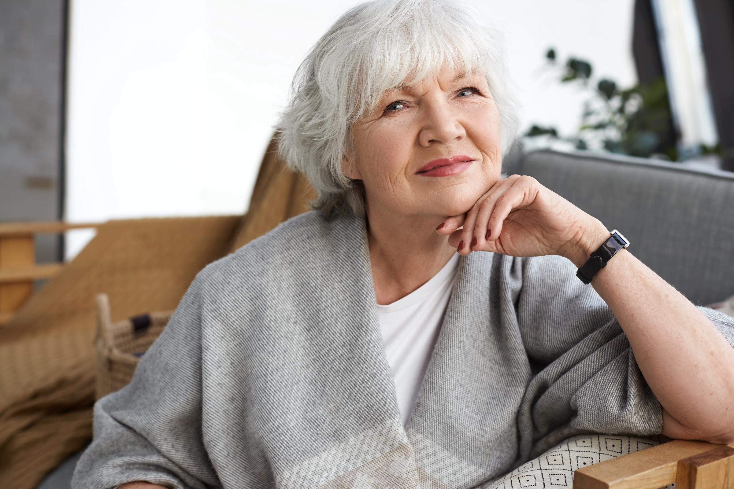 A cheerful mature woman | Source: Magnific