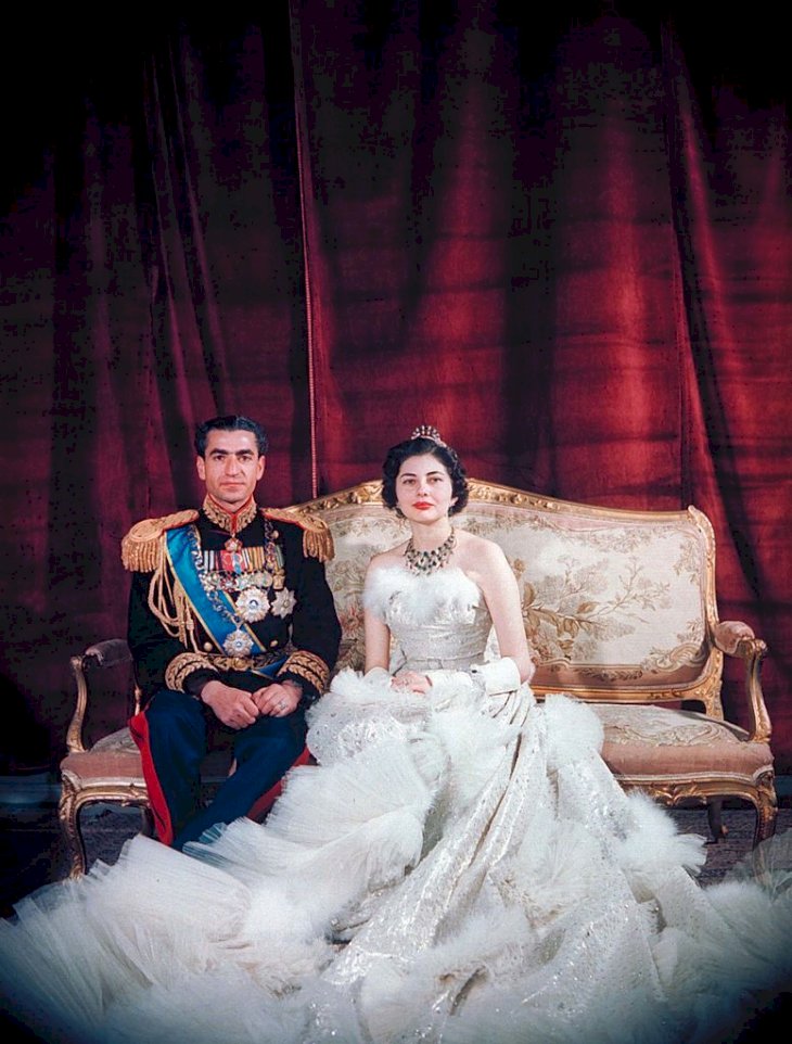 Shah Mohamed Reza Pahlevi (R), in full military attire, w. Queen Soraya (L), wearing dress designed by Christian Dior, for formal wedding portrait. (Photo by Dmitri Kessel/The LIFE Picture Collection via Getty Images)