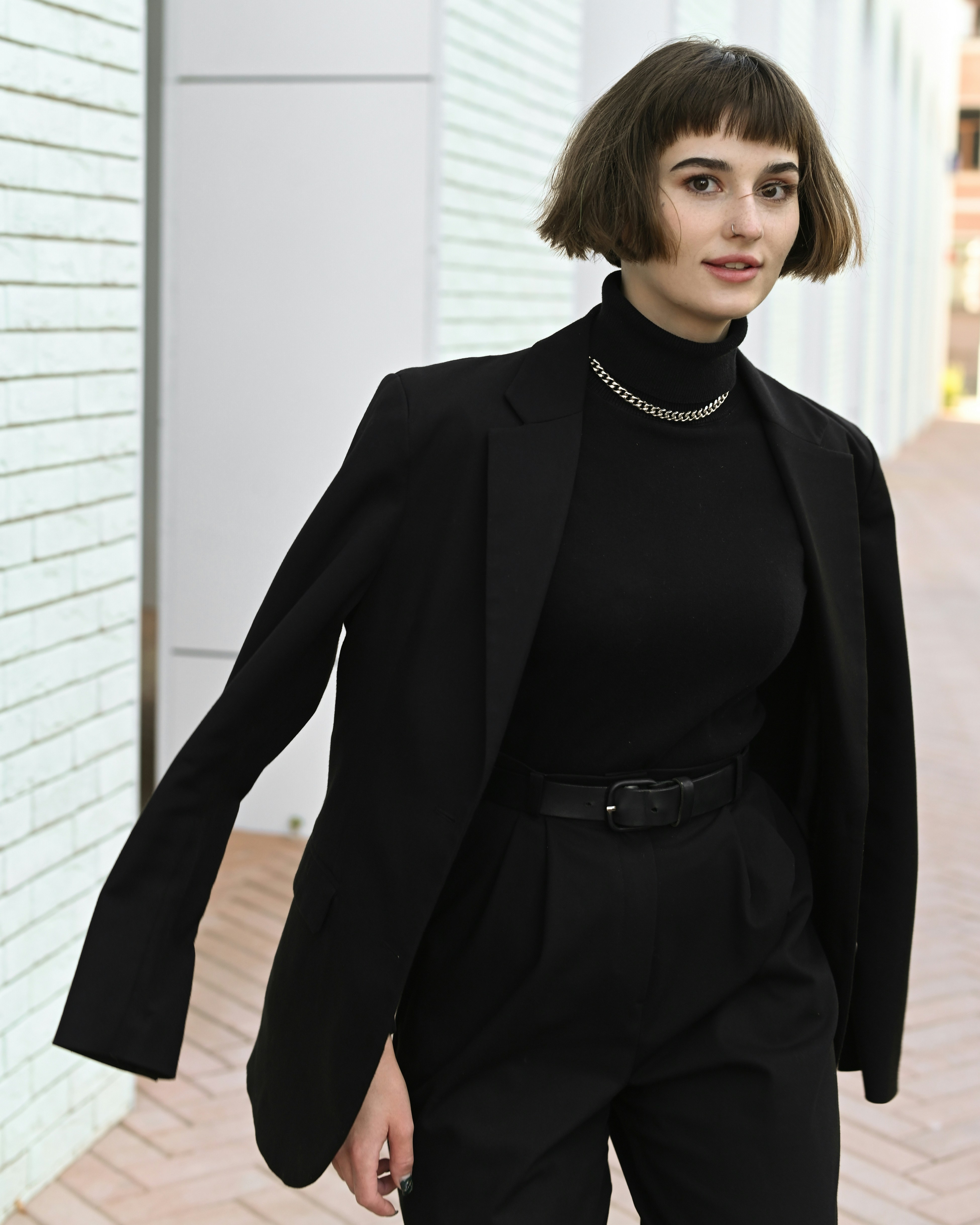 Woman wearing a black outfit | Source: Unsplash