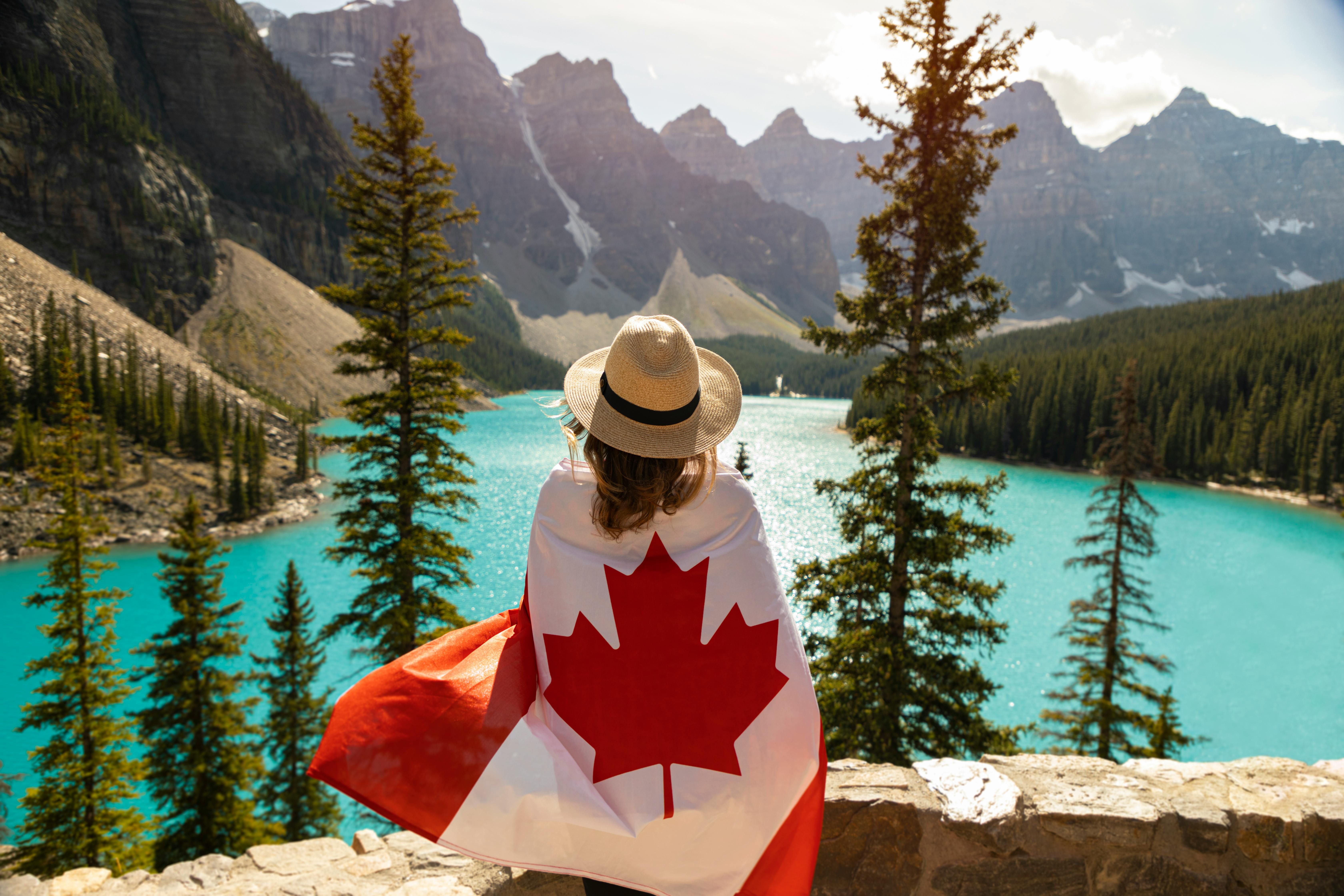 A woman draped in a Canada flag | Source: Pexels
