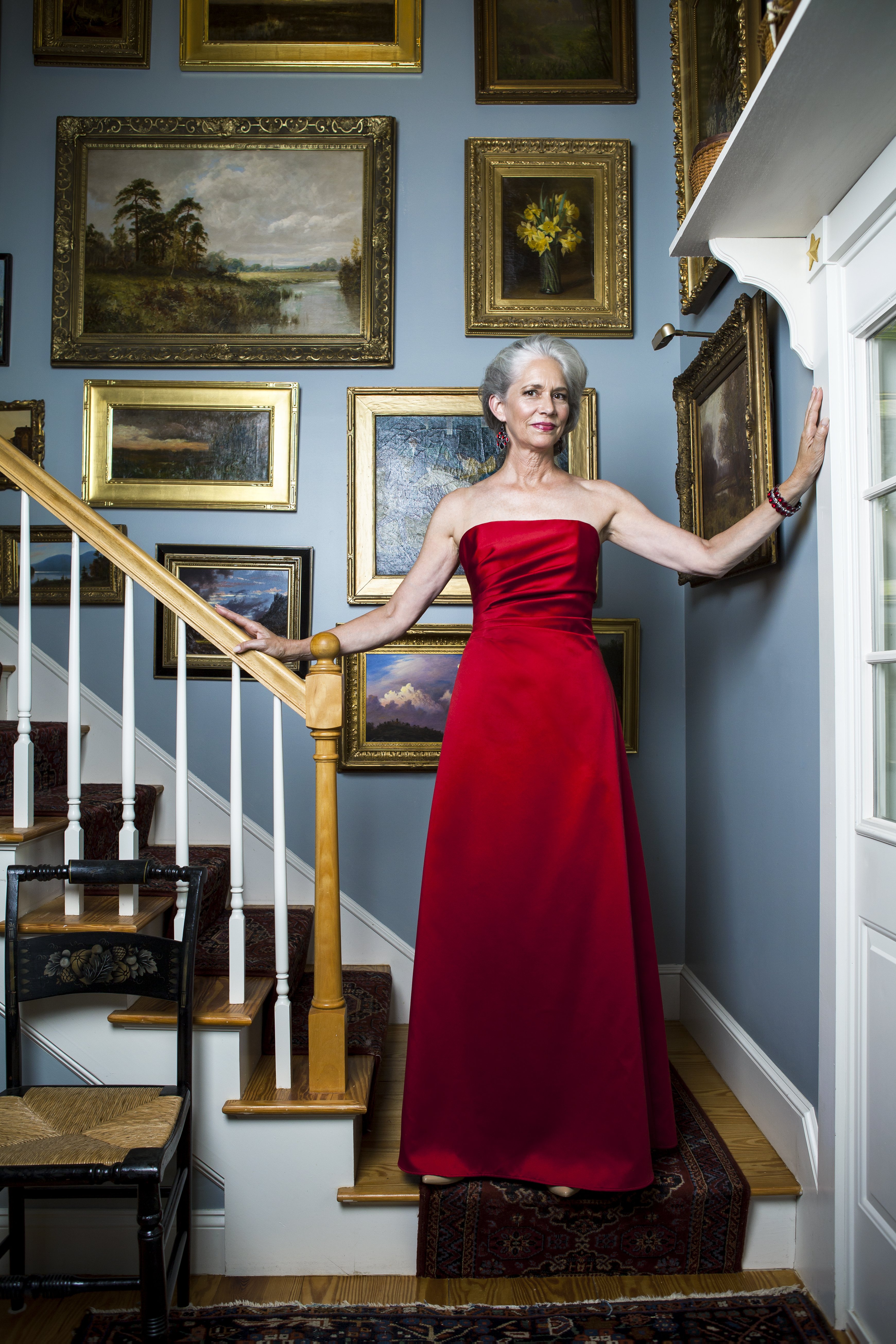 A woman posing for a picture in a red dress | Source: Getty Images 