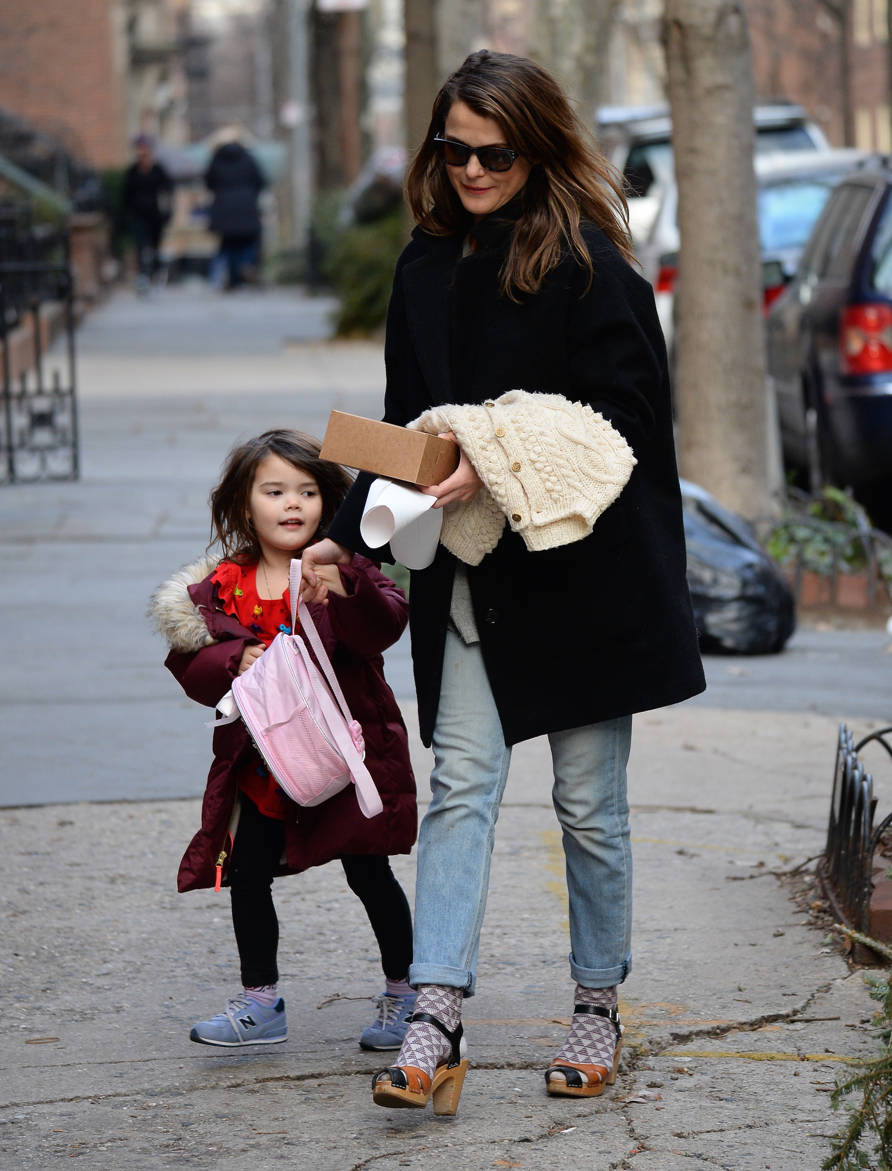 This earlier candid photo captures the mother-daughter pair during an ordinary day in New York, years before the teenager would step into the much brighter spotlight of Paris Fashion Week. | Source: Getty Images