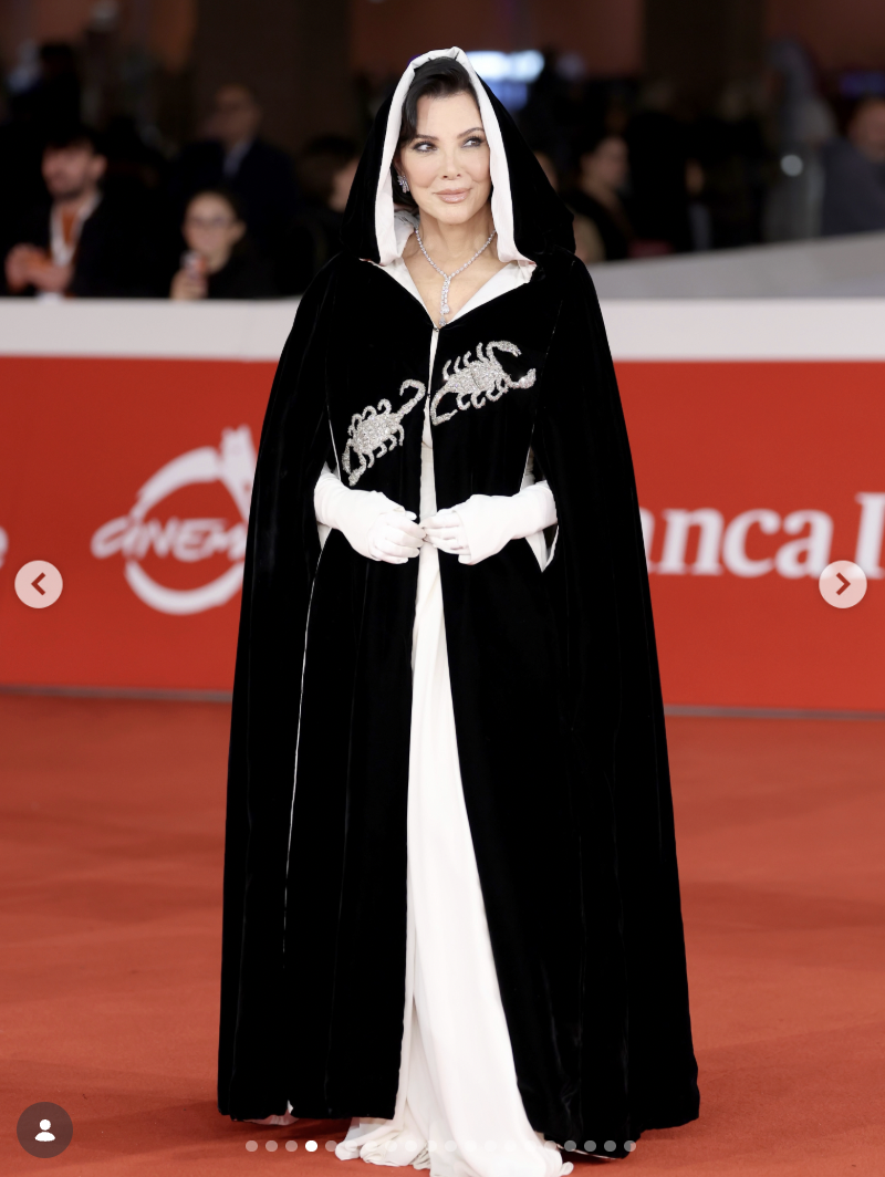 Kris Jenner wearing Elizabet Taylor's hooded cape to the season 2 premiere of "All's Fair" in Rome | Source: instagram/krisjenner