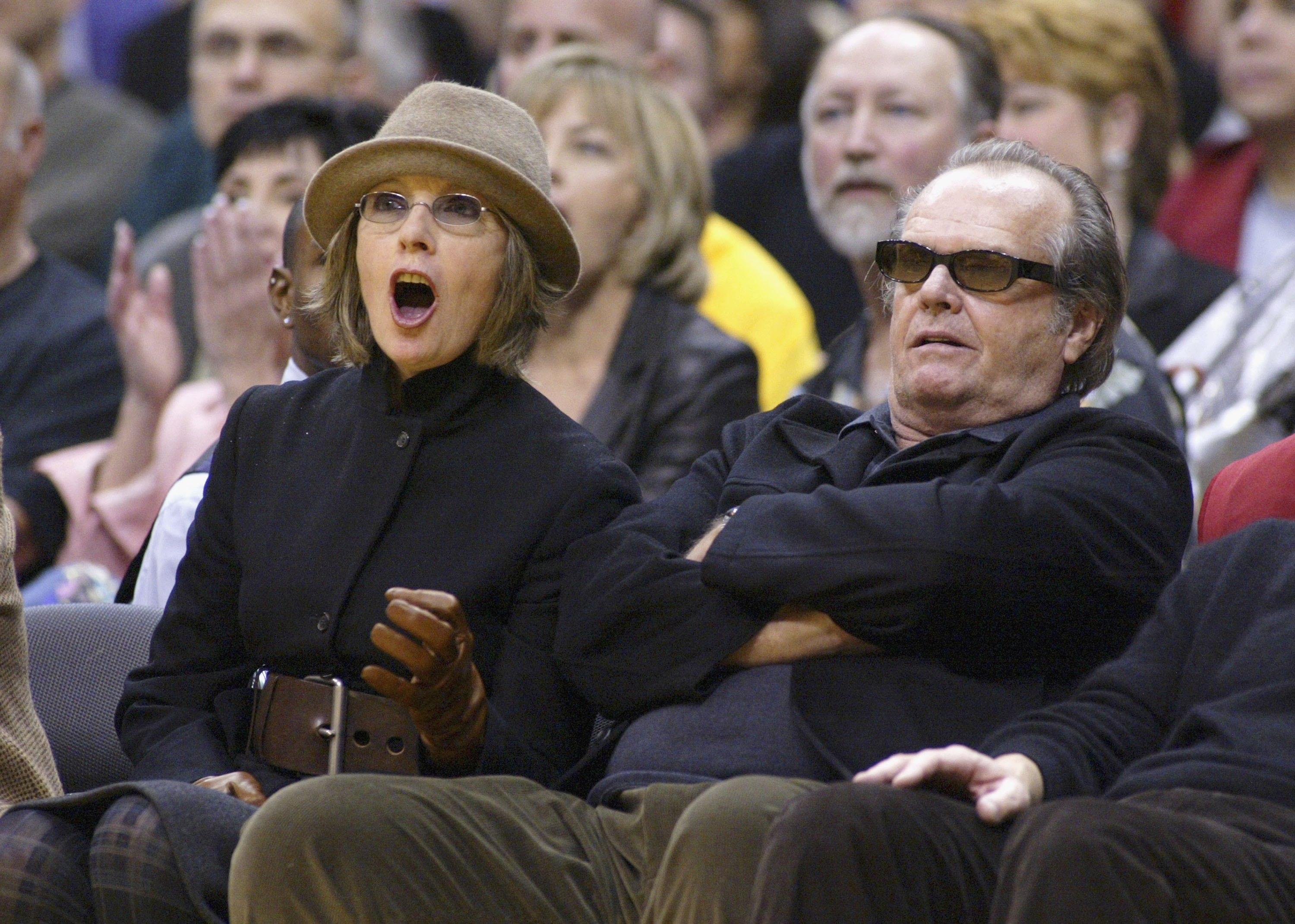 Diane Keaton and Warren Beatty attend the game between the Los Angeles Lakers and the San Antonio Spurs on November 28, 2003