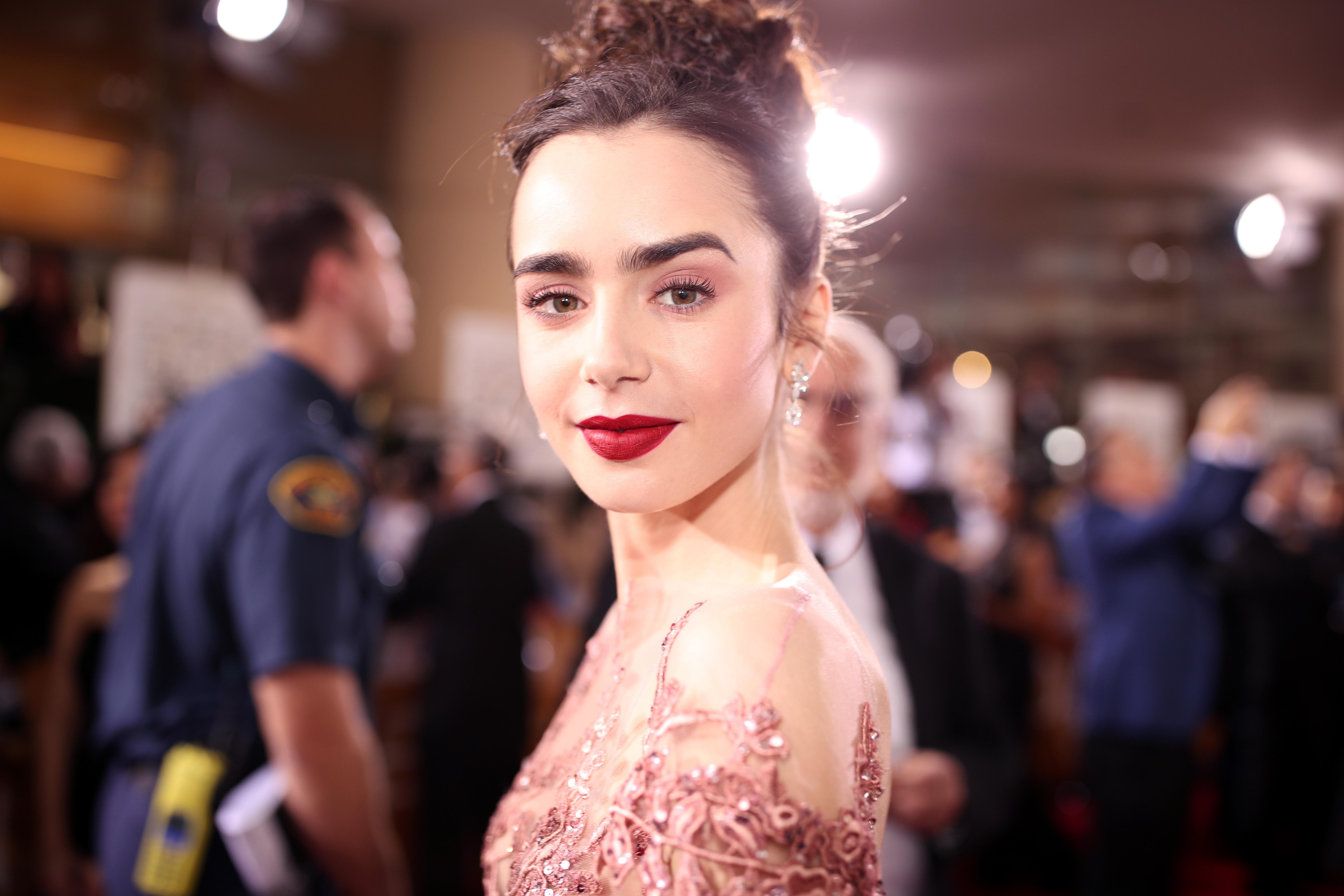 Lily Collins arrives at the 74th Annual Golden Globe Awards held at the Beverly Hilton Hotel on January 8, 2017, in Beverly Hills California. | Source: Getty Images