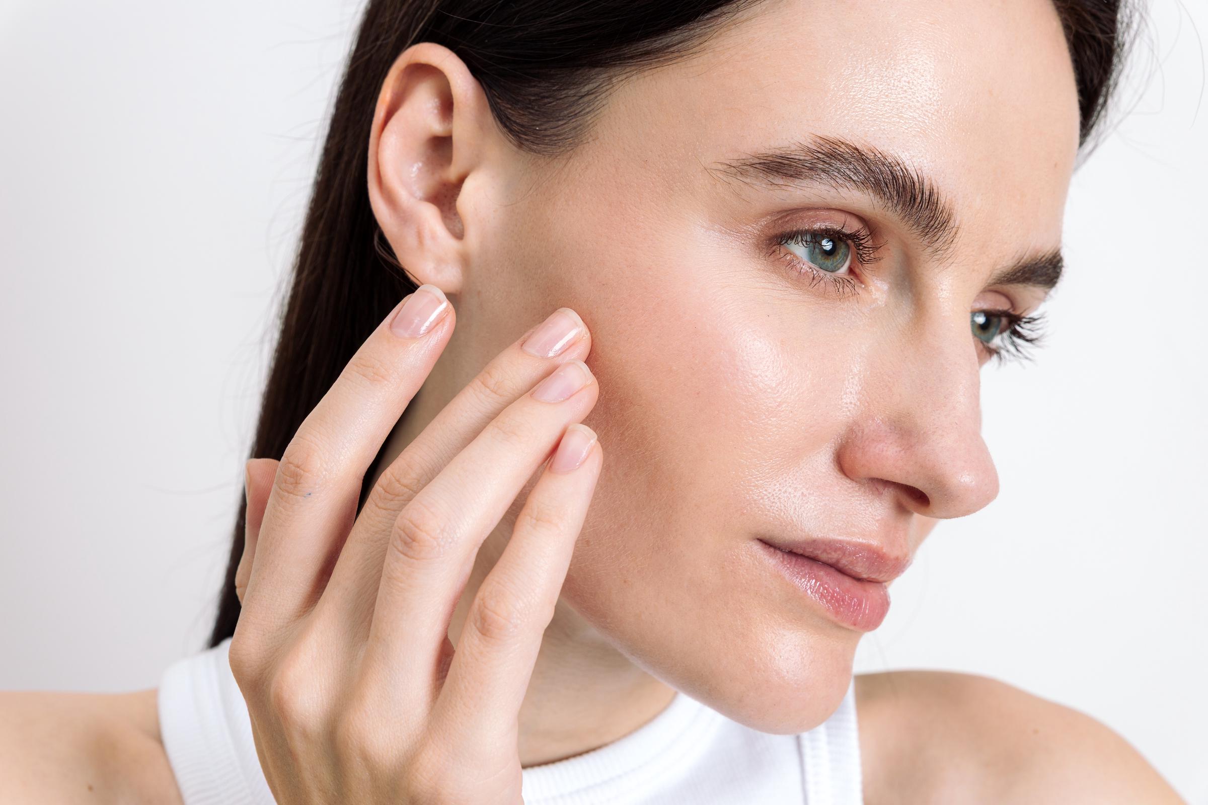 A young woman with a clear, smooth complexion | Source: Getty Images