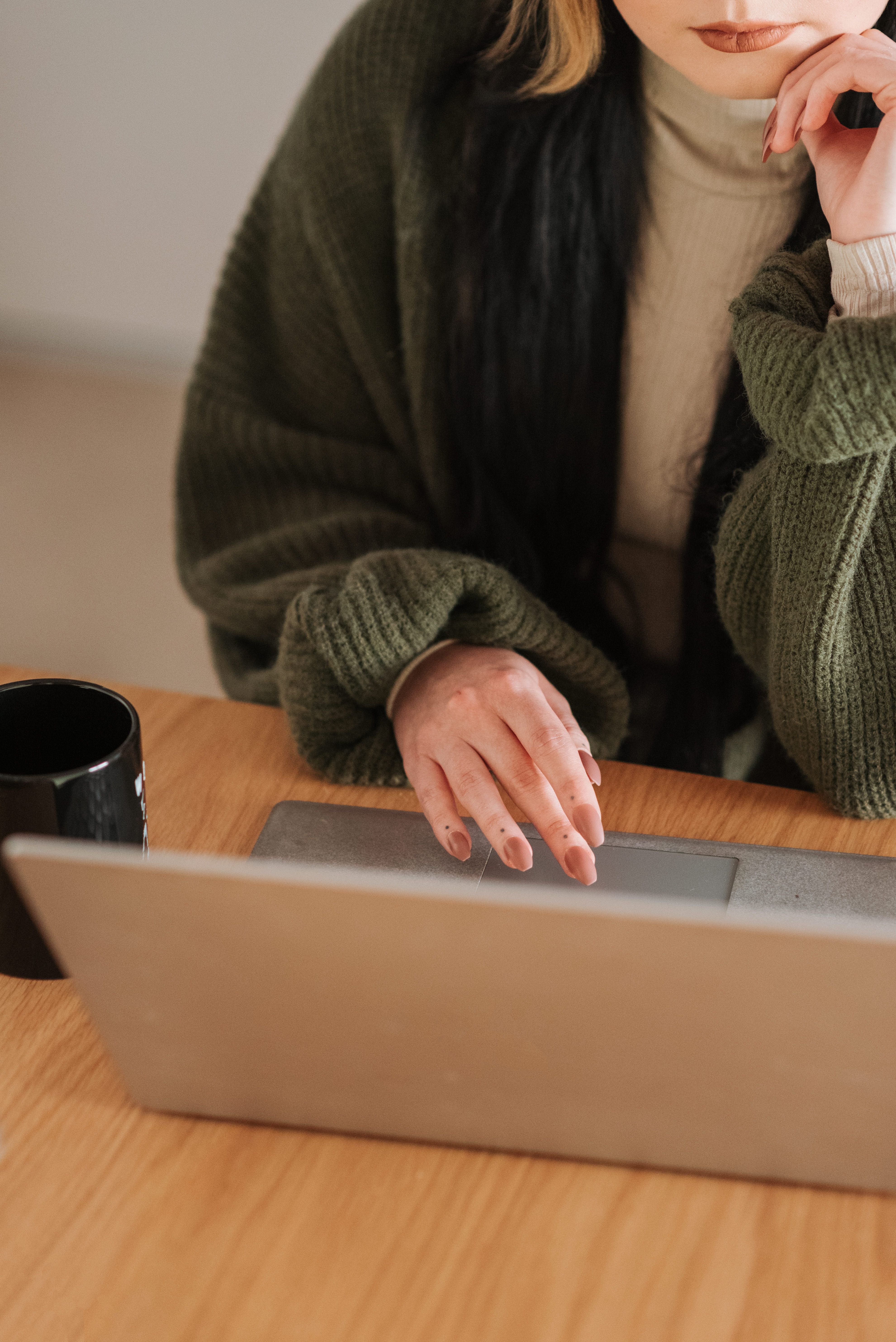 Person operating her laptop | Source: Pexels