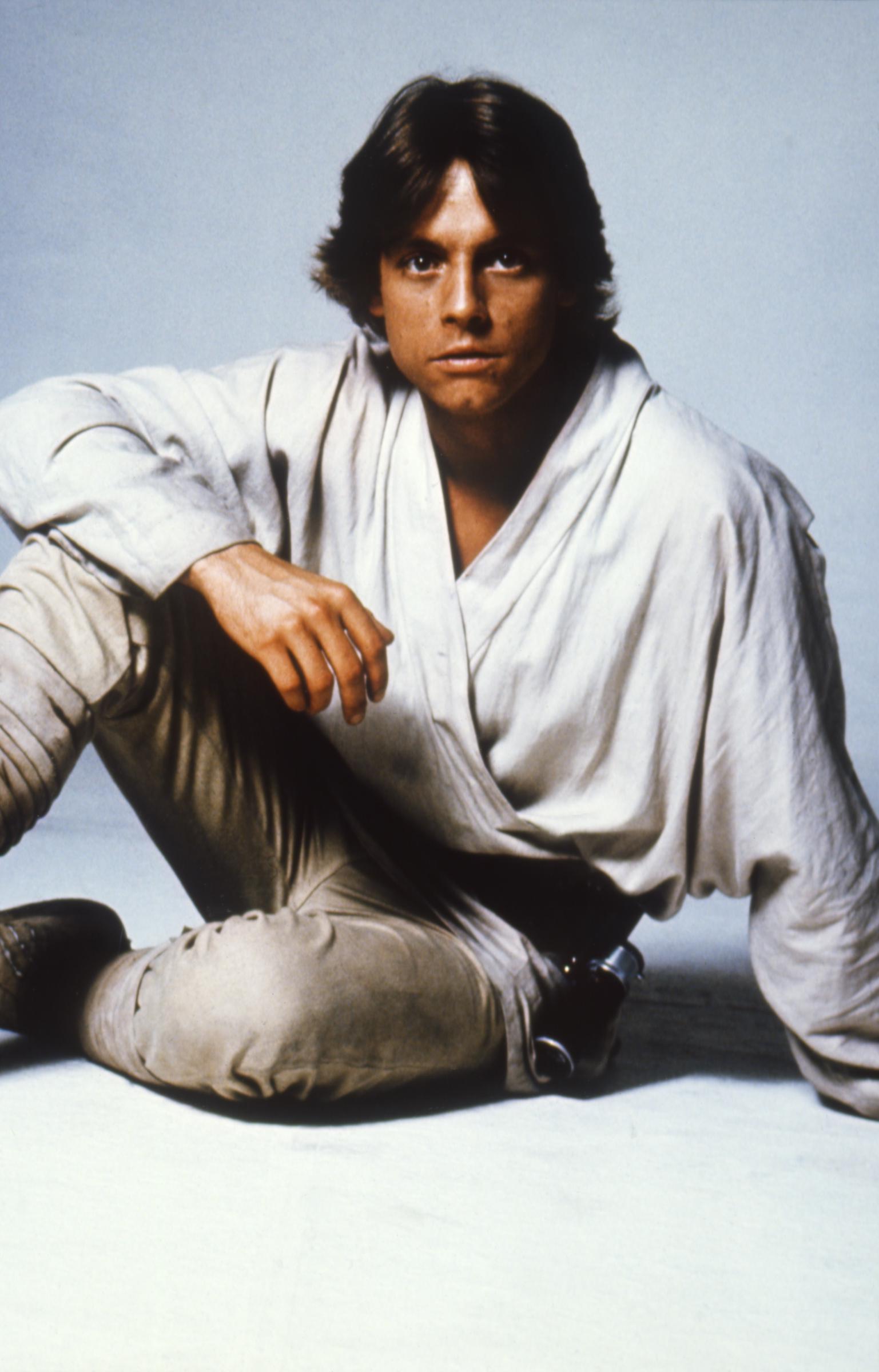 The actor posed in character for "Star Wars: A New Hope," wearing the simple, light-colored costume that became synonymous with the young hero's introduction. The portrait captured his appearance before the January 11, 1977, car crash that fractured his nose and left cheekbone. By the time the film opened on May 25, 1977, his performance had propelled the previously little-known actor to international fame. | Source: Getty Images
