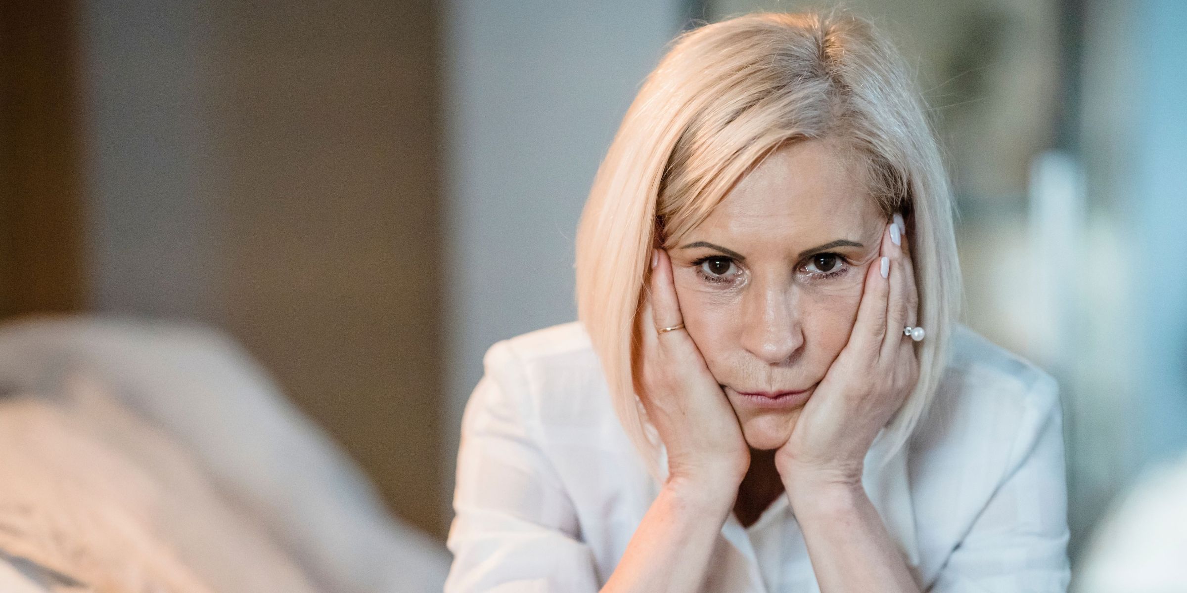 A frowning middle-aged woman | Source: Pexels