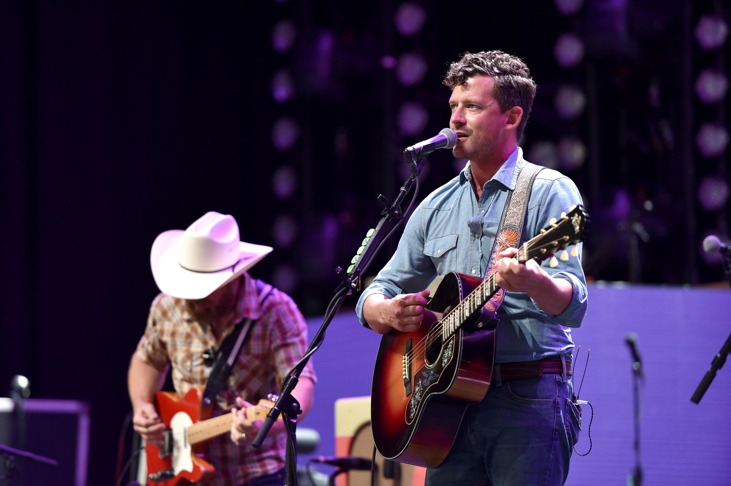 Turnpike Troubadours frontman Evan Felker performs onstage alongside bandmate Ryan Engleman during The Bandwagon Tour in Mansfield, Massachusetts, on July 21, 2018. Felker joined the co-headlining tour during his brief romance with Miranda Lambert, whom he dated for several months between February and August of that year. While their whirlwind relationship proved short-lived, Lambert soon embraced her independence as a single woman, only to meet future husband Brendan McLoughlin just a few months later. | Source: Getty Images