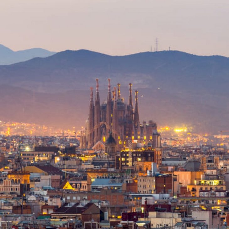  Aerial Panorama view of Barcelona city skyline and Sagrada Familia at dusk time, Spain | Shutterstock