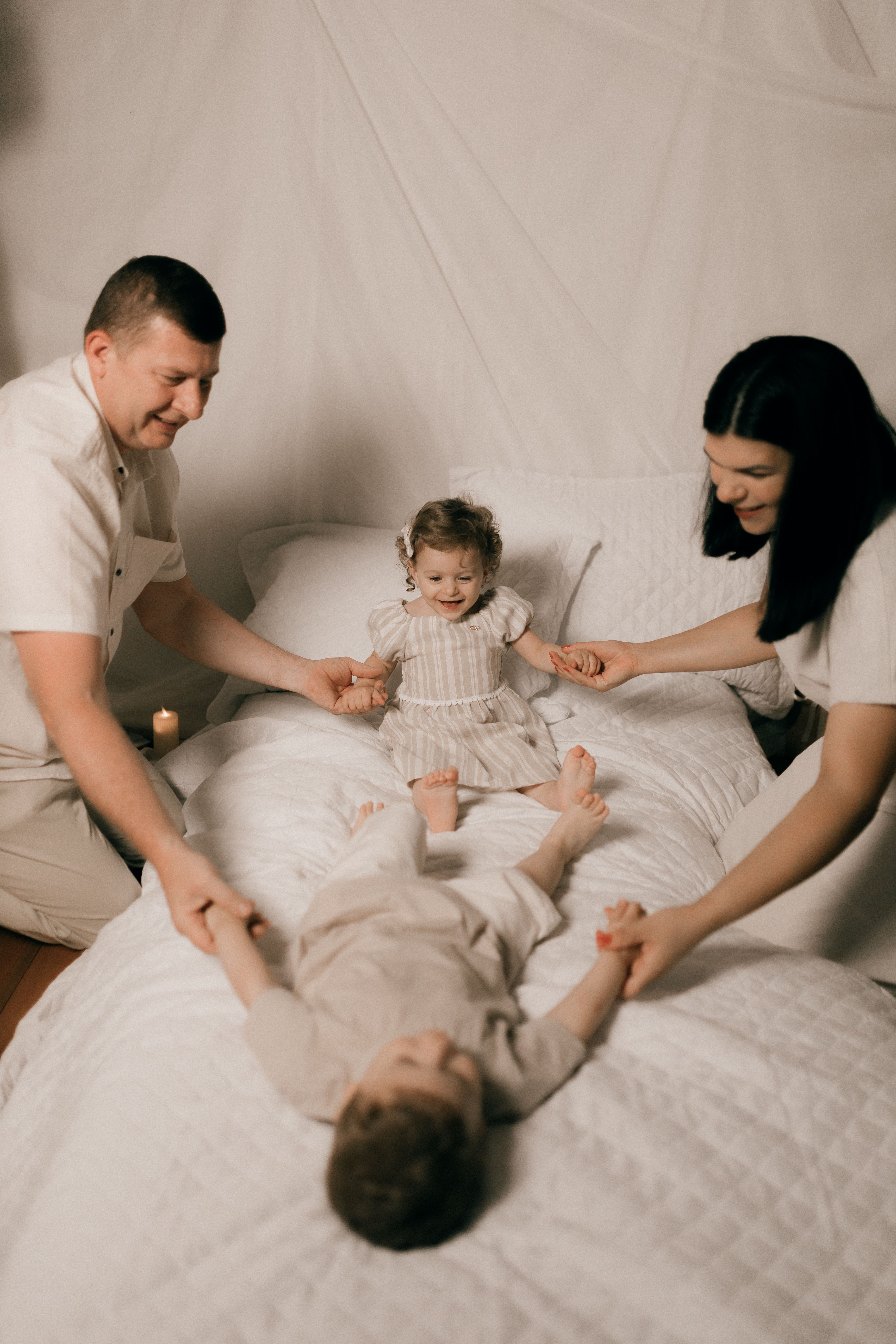 Family of four playing together | Source: Pexels