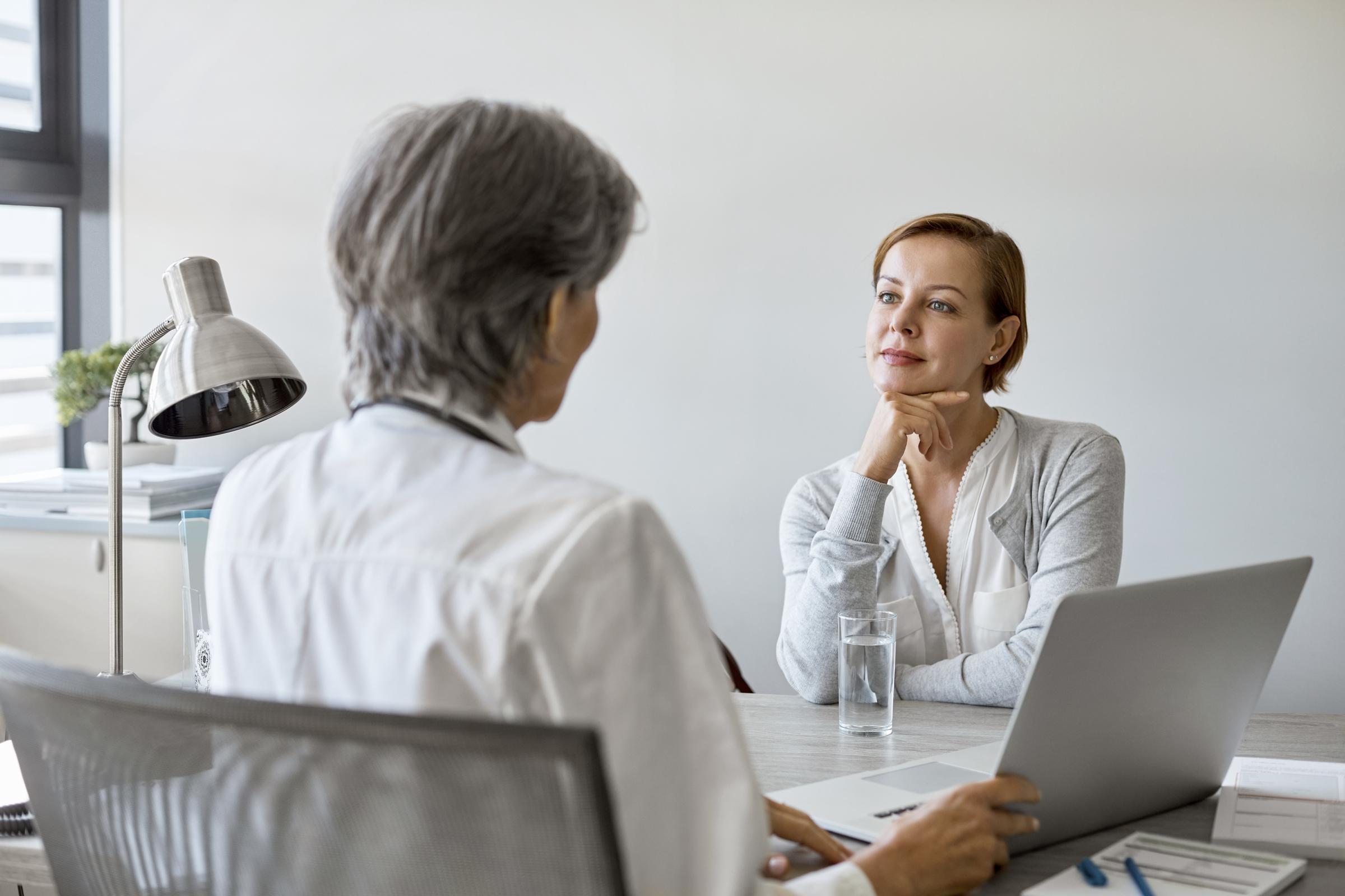 A woman listening to her doctor | Source: Getty Images
