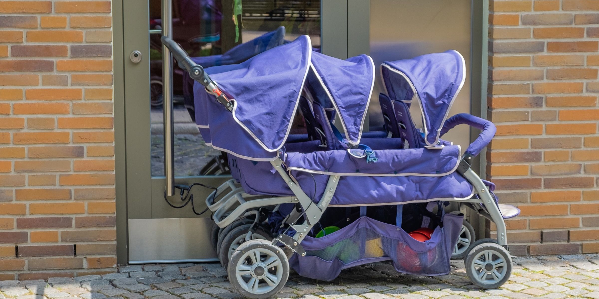 A stroller for three babies | Source: Shutterstock