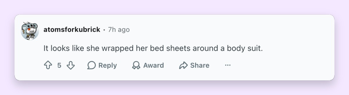 One Reddit user compared the unusual construction of Moore's dramatic two-tone gown to bedsheets wrapped around a bodysuit. | Source: Reddit/whatthefrockk