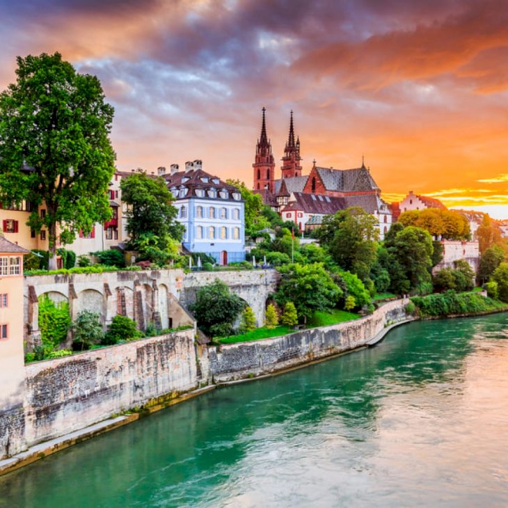 Old town with red stone Munster cathedral on the Rhine river. Basel, Switzerland. | Shutterstock