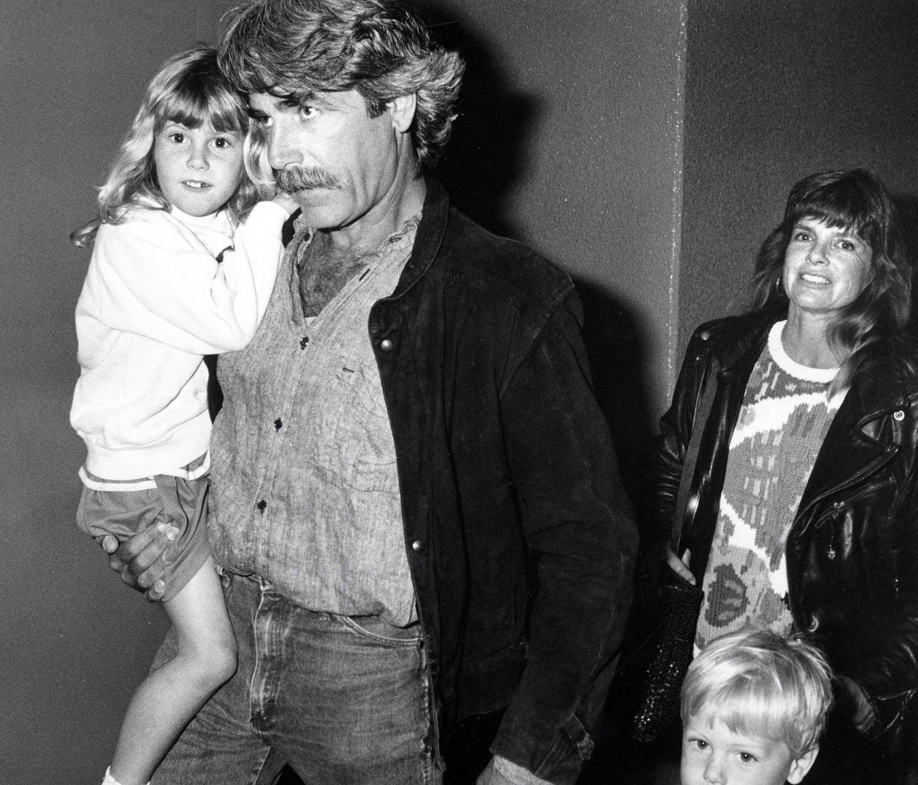 Sam Elliott, Katharine Ross, and their daughter Cleo Rose Elliott and a guest at The Moscow Circus on March 14, 1990, in Inglewood, California | Source: Getty Images