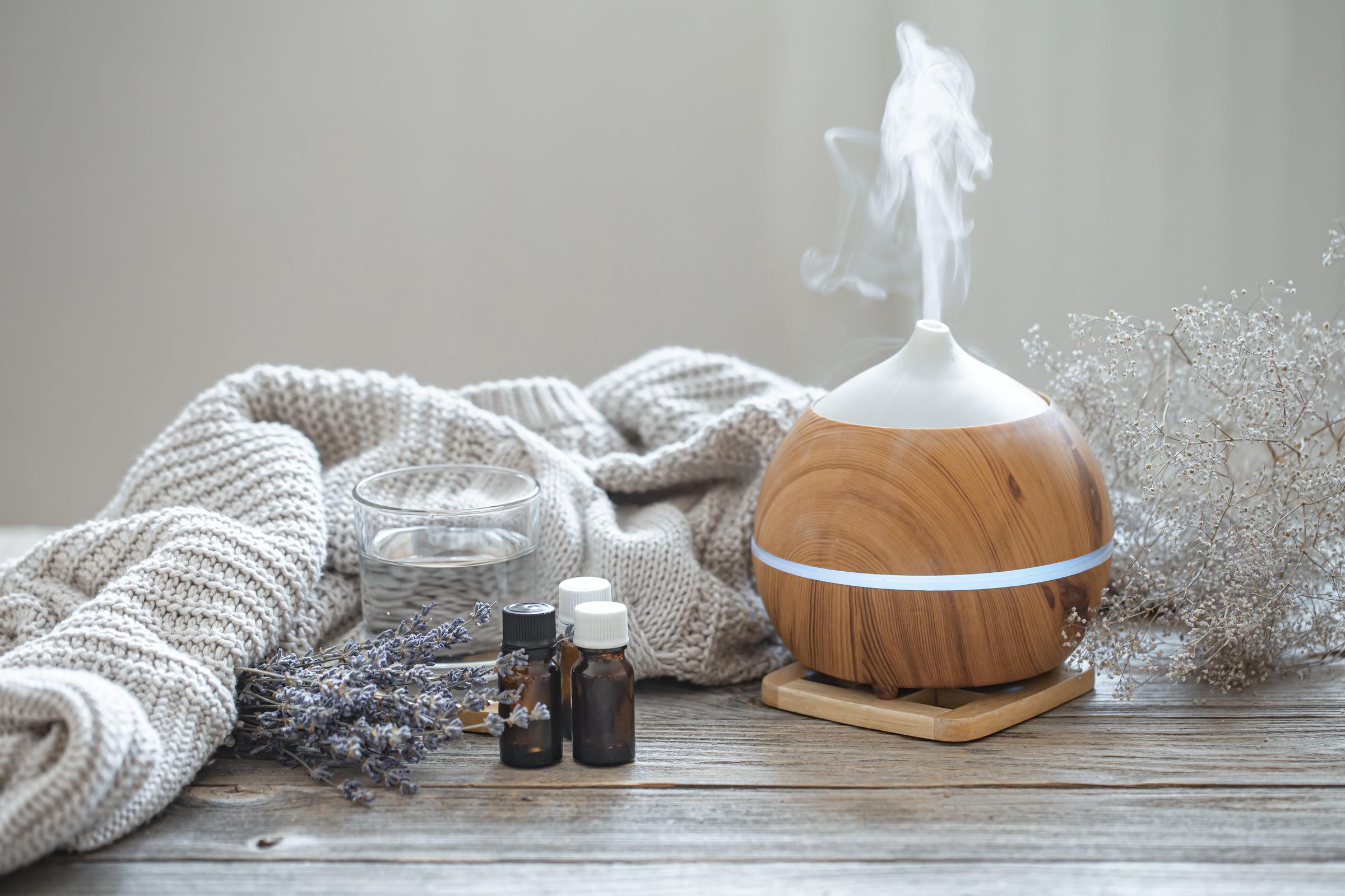 Oil diffuser on a wood surface | Source: Pexels
