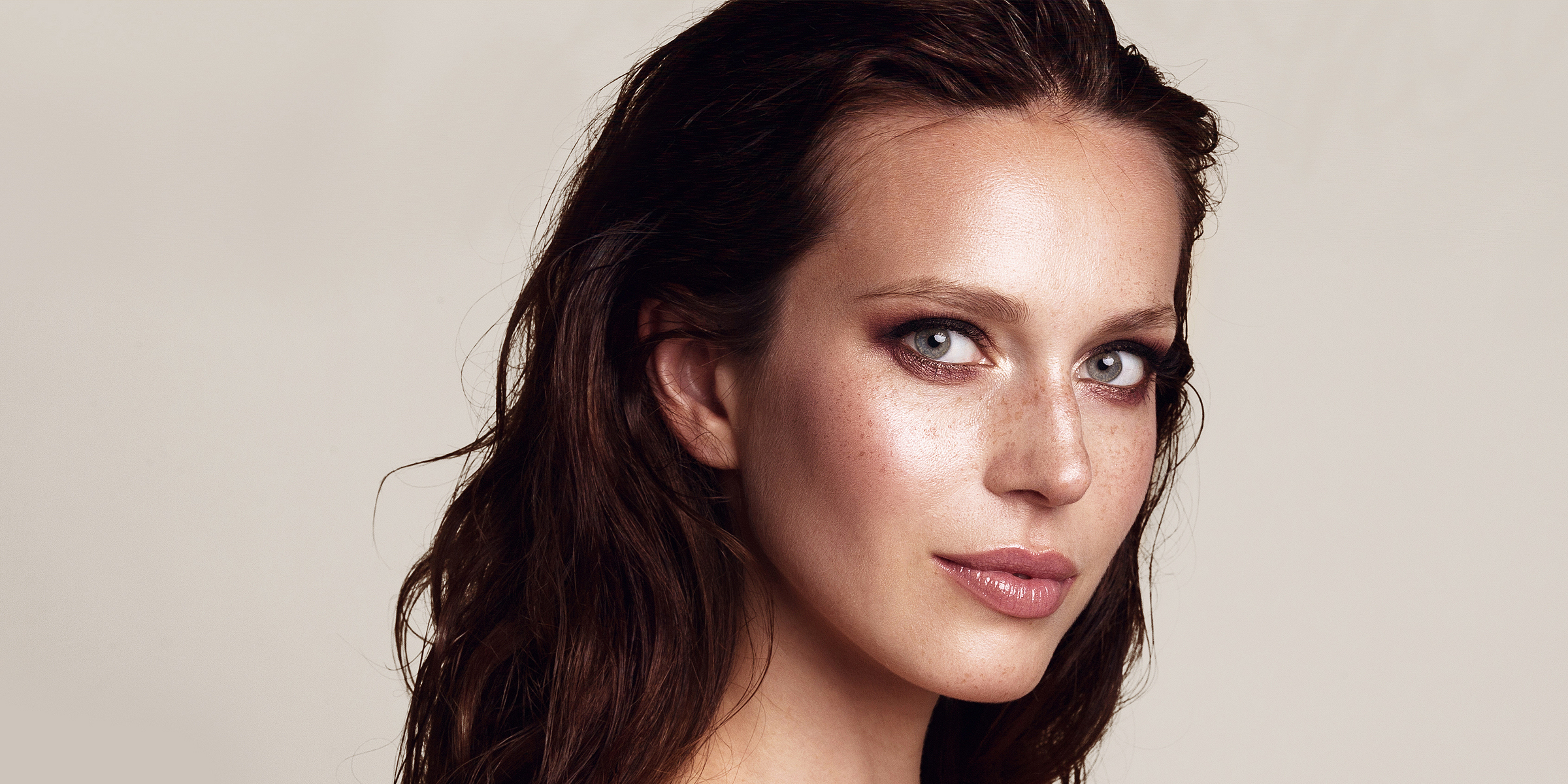 A Woman with a Wet Makeup Look | Source: Getty Images