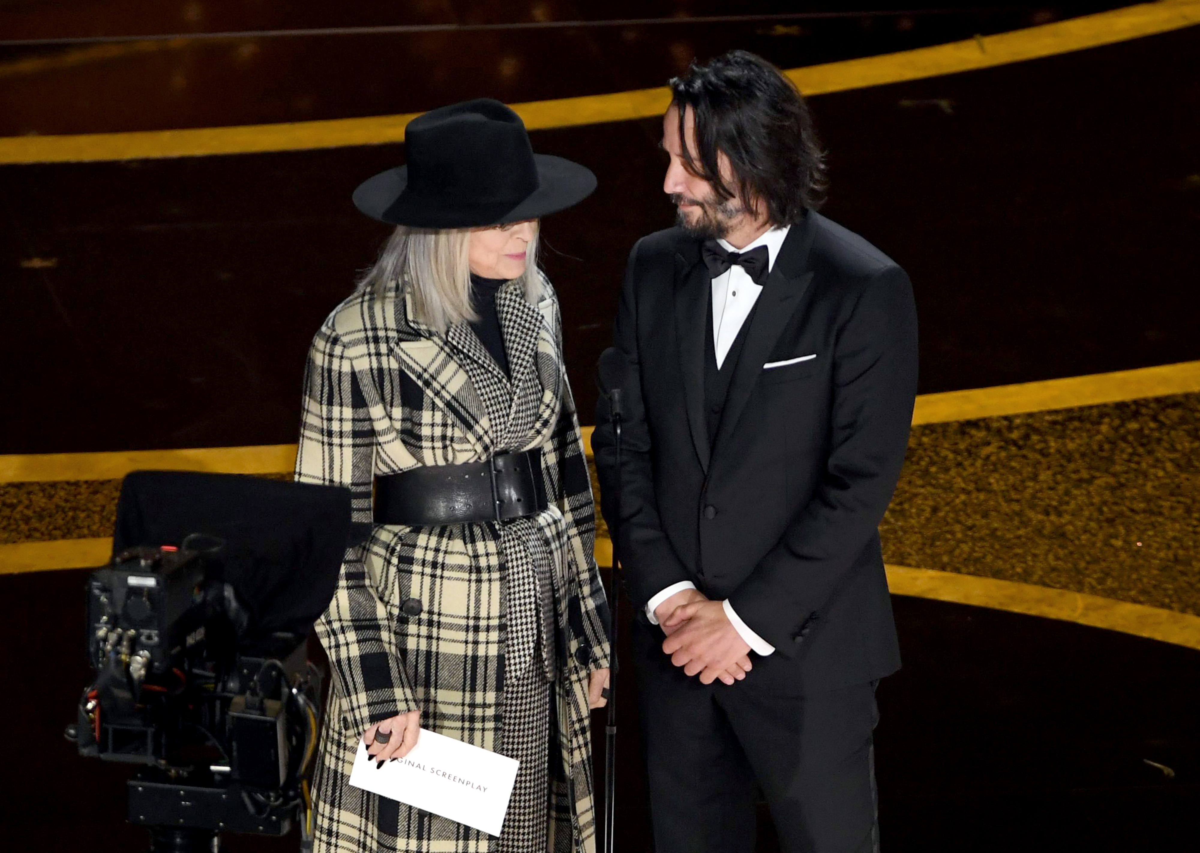 Diane Keaton and Keanu Reeves speak onstage during the 92nd Annual Academy Awards on February 9, 2020