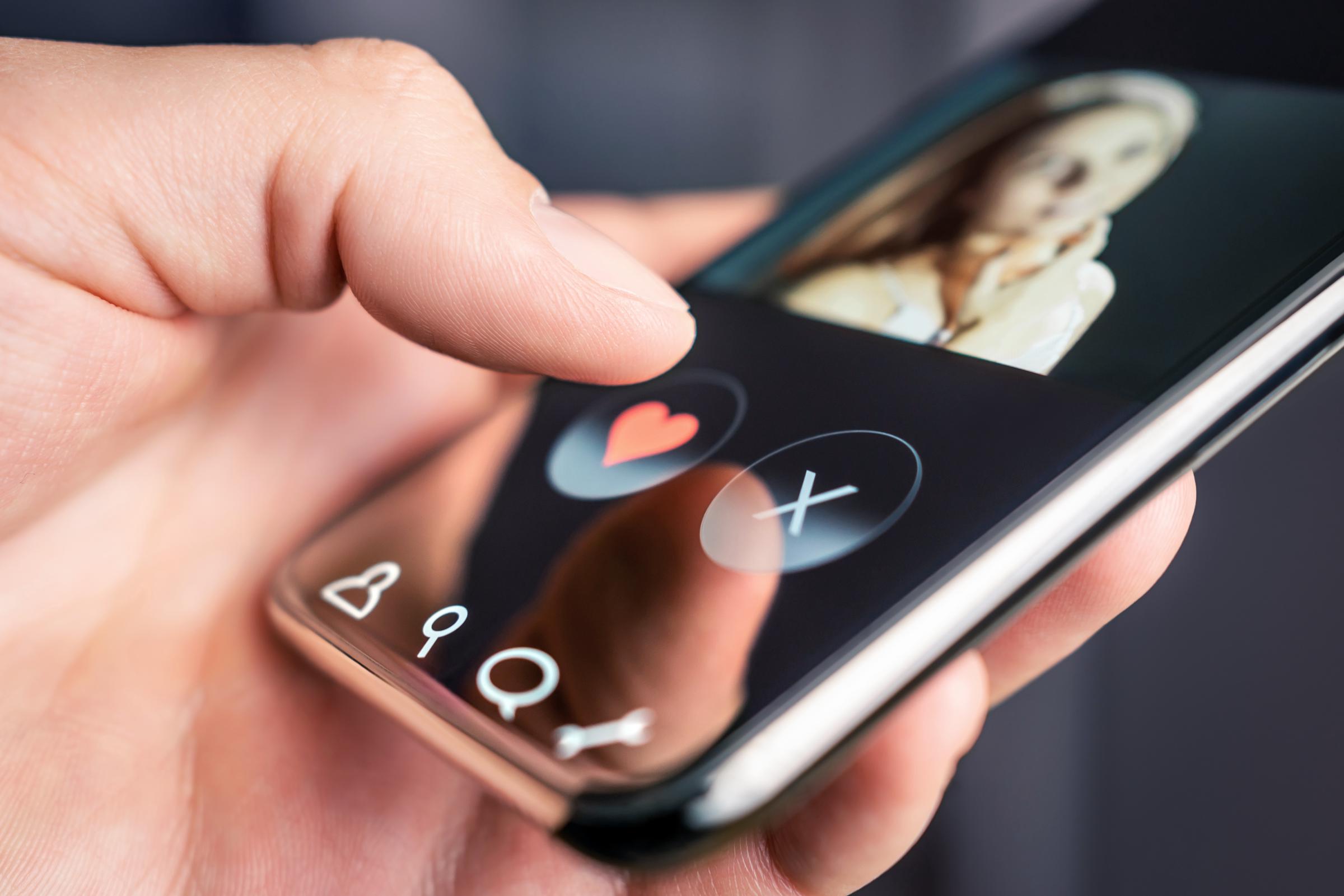 A person using a dating app | Source: Shutterstock