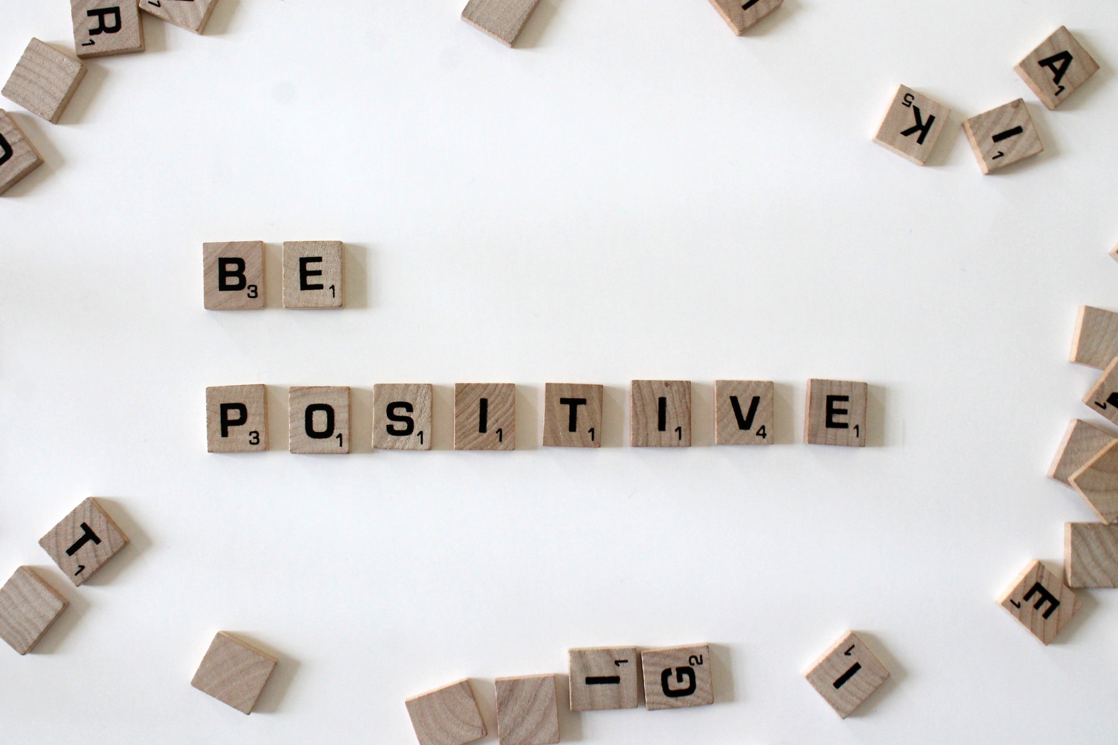 'Be positive' scrabble tiles | Unsplash 