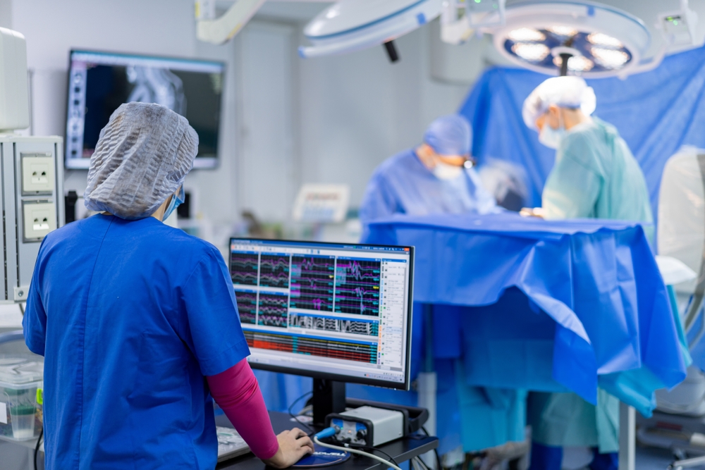 Surgeons in a hospital room | Source: Shutterstock
