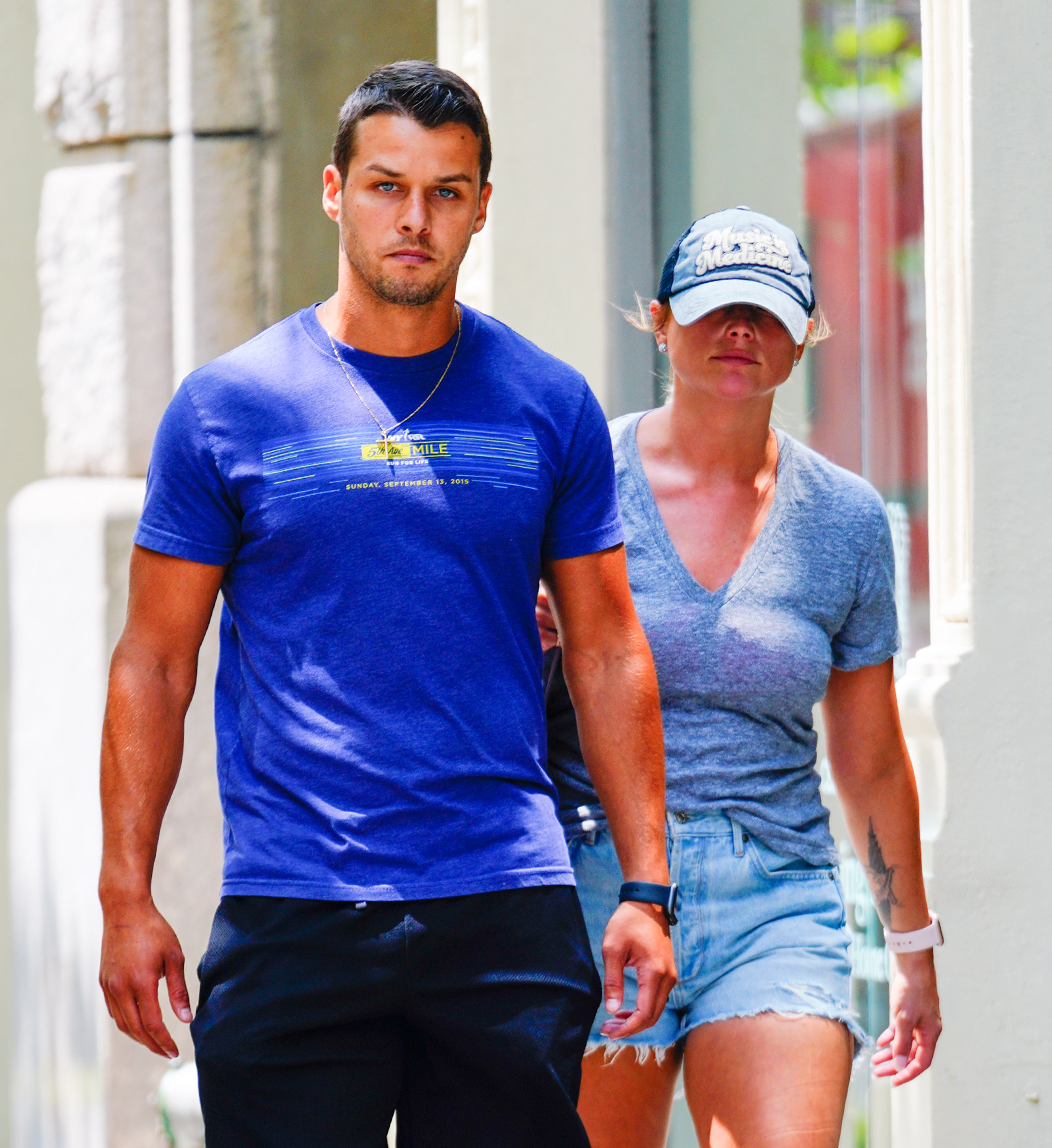 Miranda Lambert and husband Brendan McLoughlin keep it casual as they walk together through New York City on July 9, 2019. Sporting denim cutoffs, a cap, and summer tees, the newlyweds embraced relaxed, everyday life in McLoughlin's home city just months into their whirlwind marriage. Finding steady comfort together away from the red carpet, the couple prioritized private, grounded communication that helped build the strong foundation of their lasting bond. | Source: Getty Images