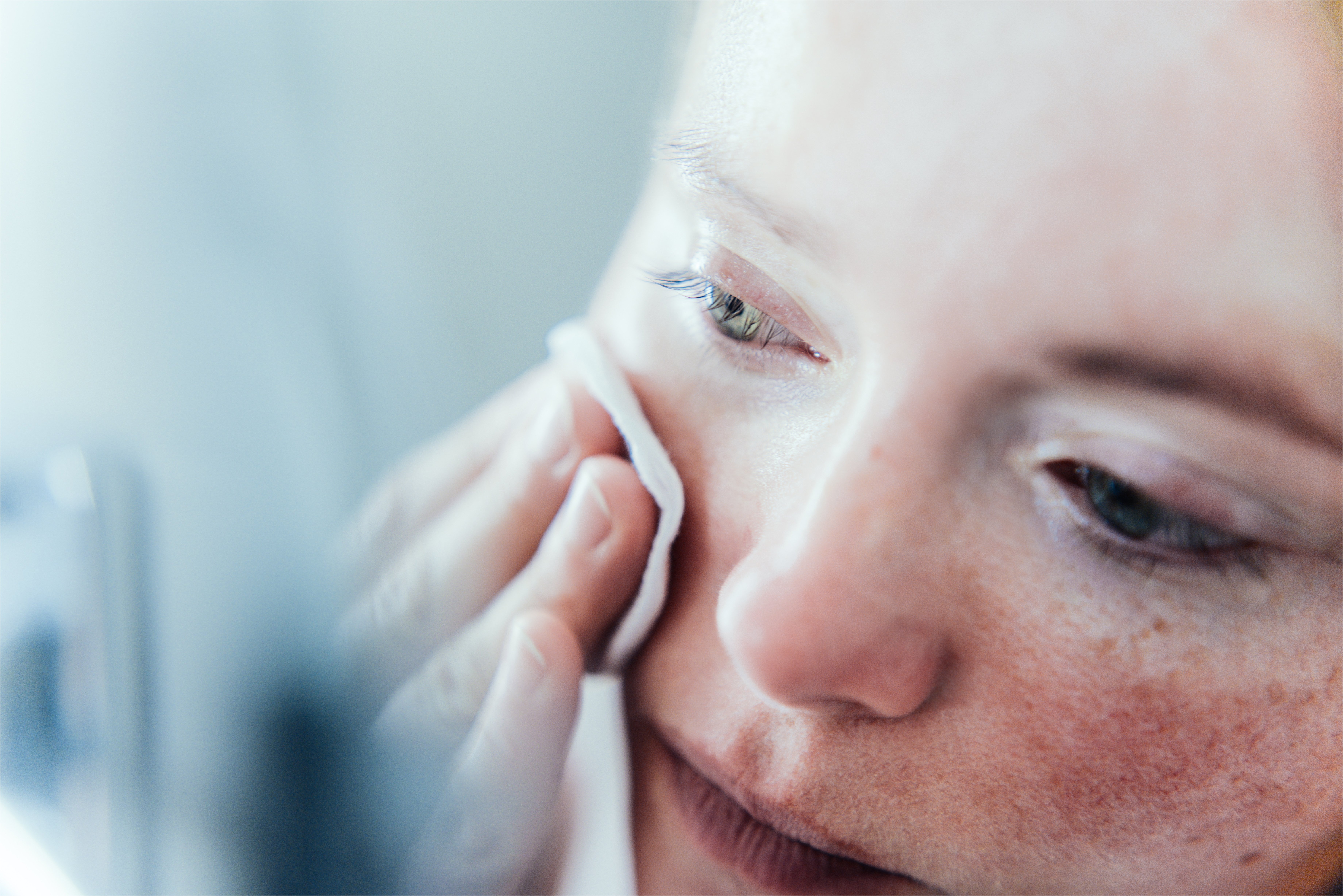 Woman removing make up. | Source: Getty Images