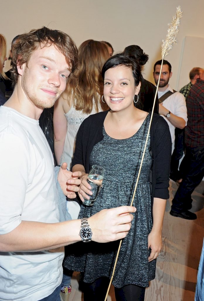 LONDON, ENGLAND - JULY 28: (EMBARGOED FOR PUBLICATION IN UK TABLOID NEWSPAPERS UNTIL 48 HOURS AFTER CREATE DATE AND TIME. MANDATORY CREDIT PHOTO BY DAVE M. BENETT/GETTY IMAGES REQUIRED) Lily Allen (R) and brother Alfie Allen attend a private view of works by five leading artists who have created pieces inspired by Reebok's Zig Tech technology hosted by Reebok and style magazine Wallpaper* at The Great Room on July 28, 2011 in London, England. (Photo by Dave M. Benett/Getty Images) 