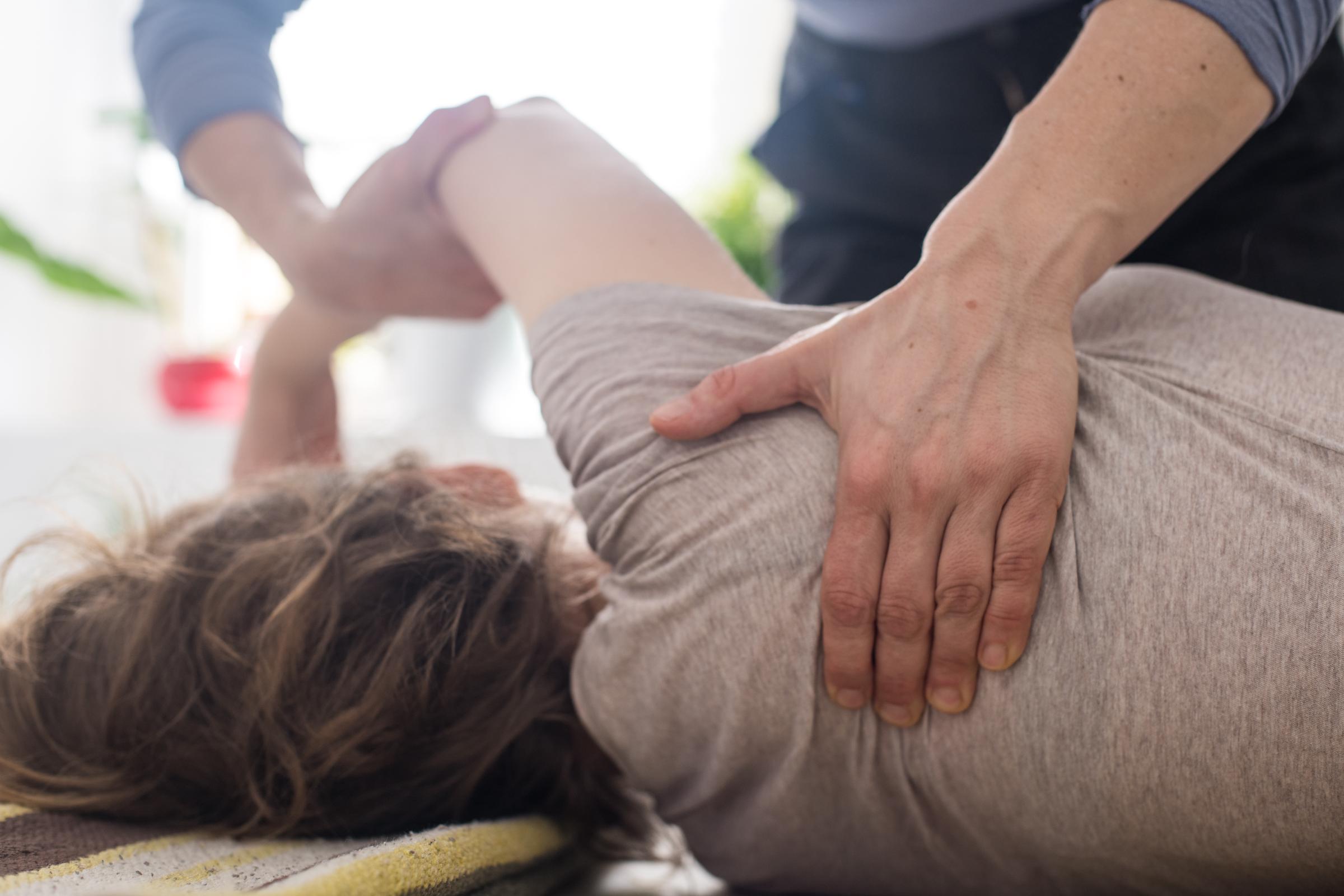 A woman practicing somatic movement in her health studio | Source: Getty Images