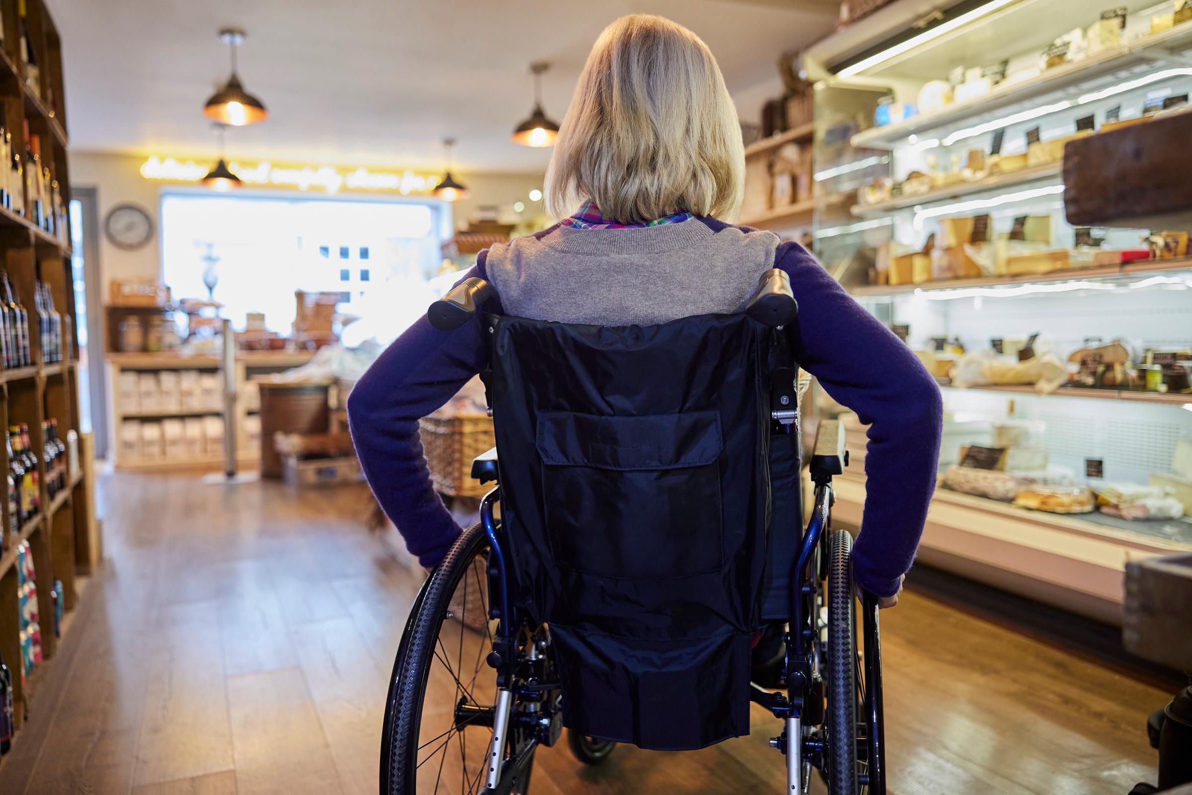 A woman using a wheelchair | Source: Shutterstock