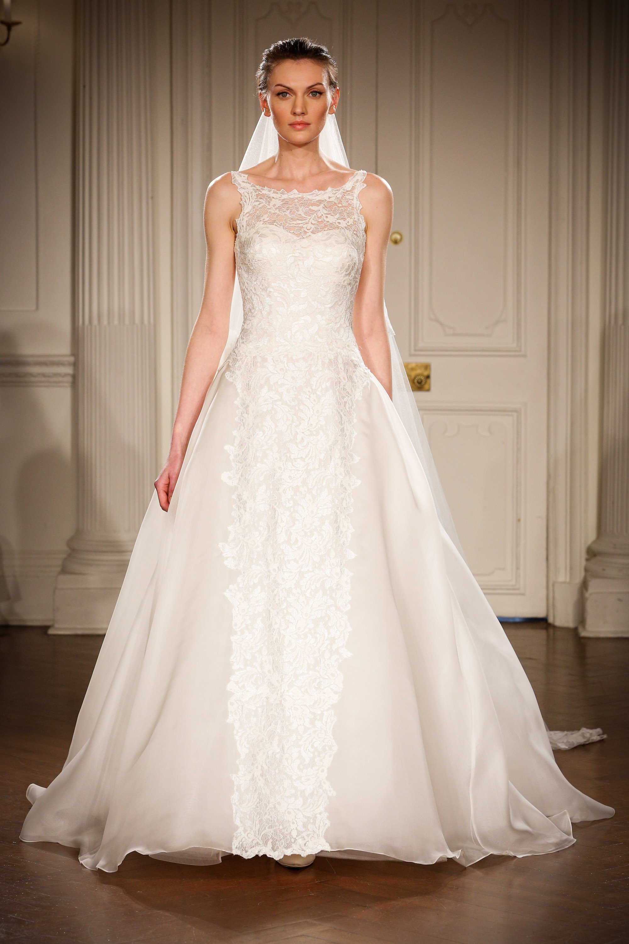 A model walks the runway in a wedding dress | Source: Getty Images