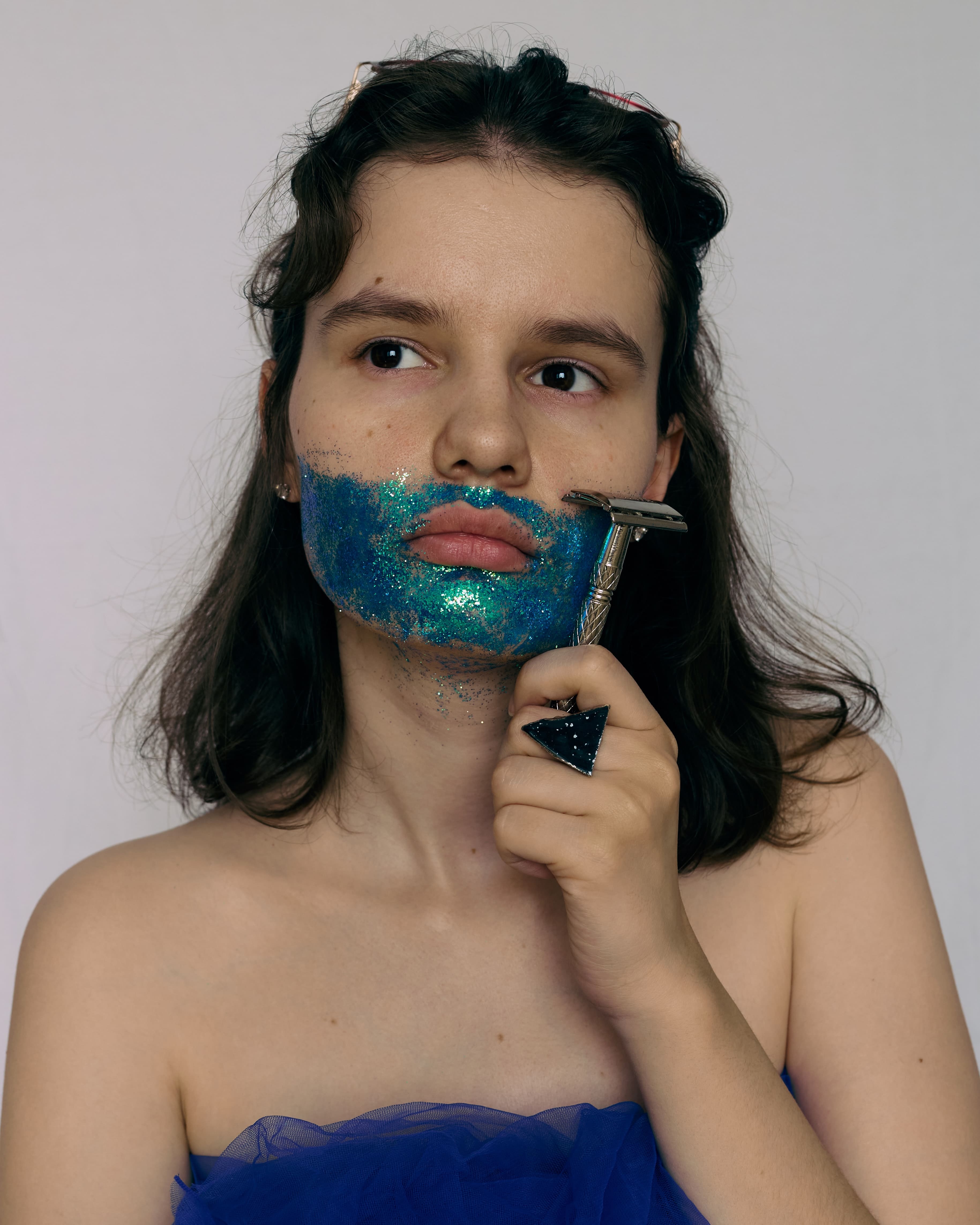 Woman shaving | Shutterstock