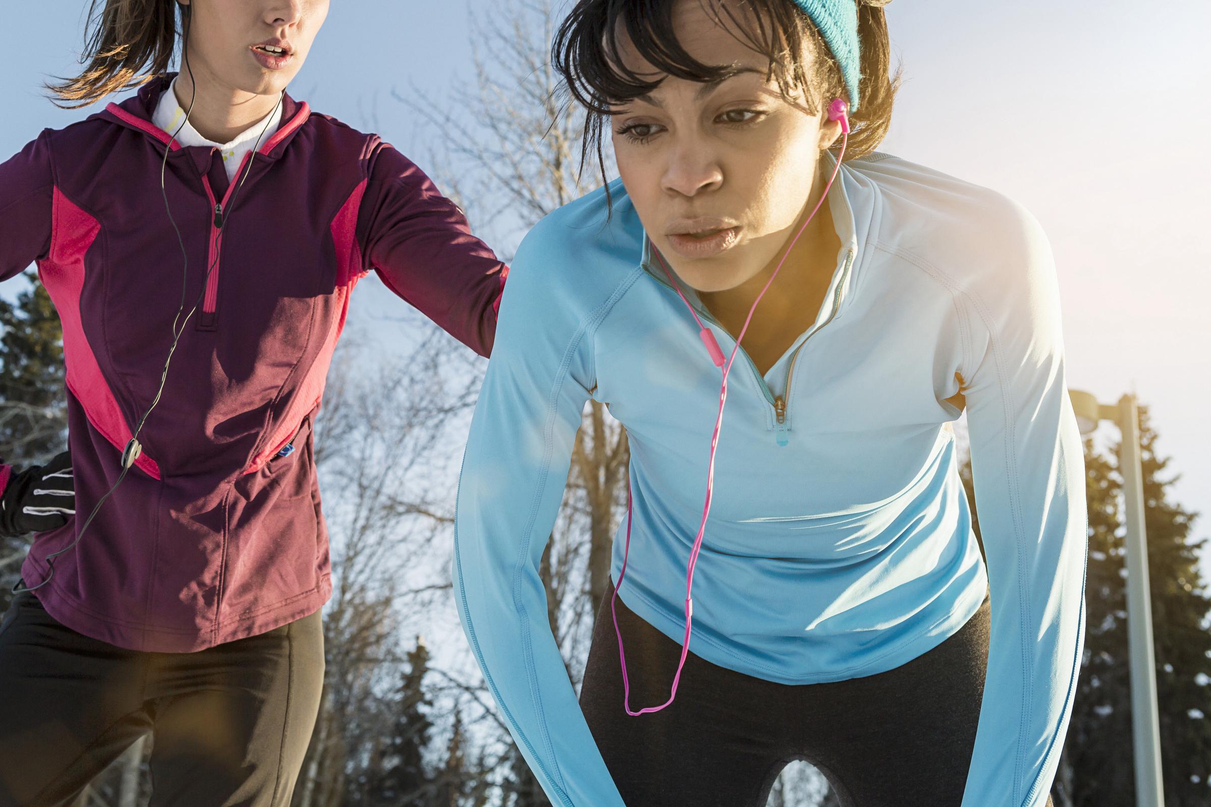 A woman catching her breath while running | Source: Getty Images