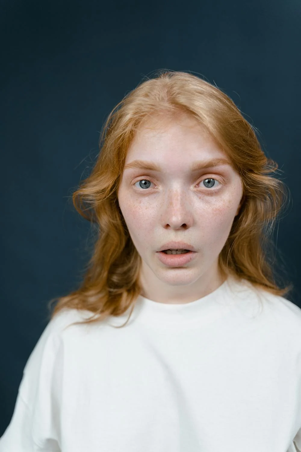 A shocked woman with her mouth open | Source: Pexels