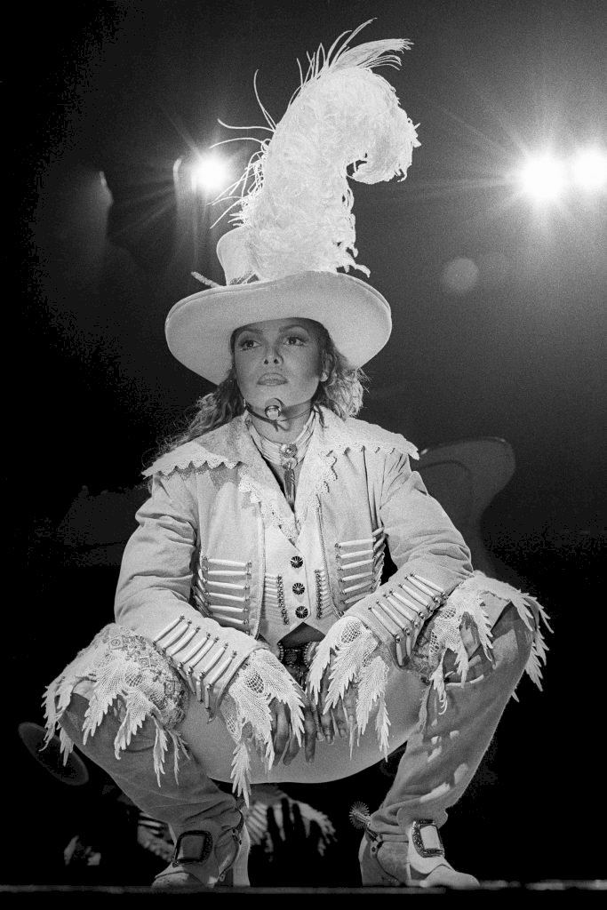 OAKLAND, UNITED STATES - FEBRUARY 18: Janet Jackson performing at the Oakland Coliseum on February 18, 1994. (Photo by Clayton Call/Redferns)