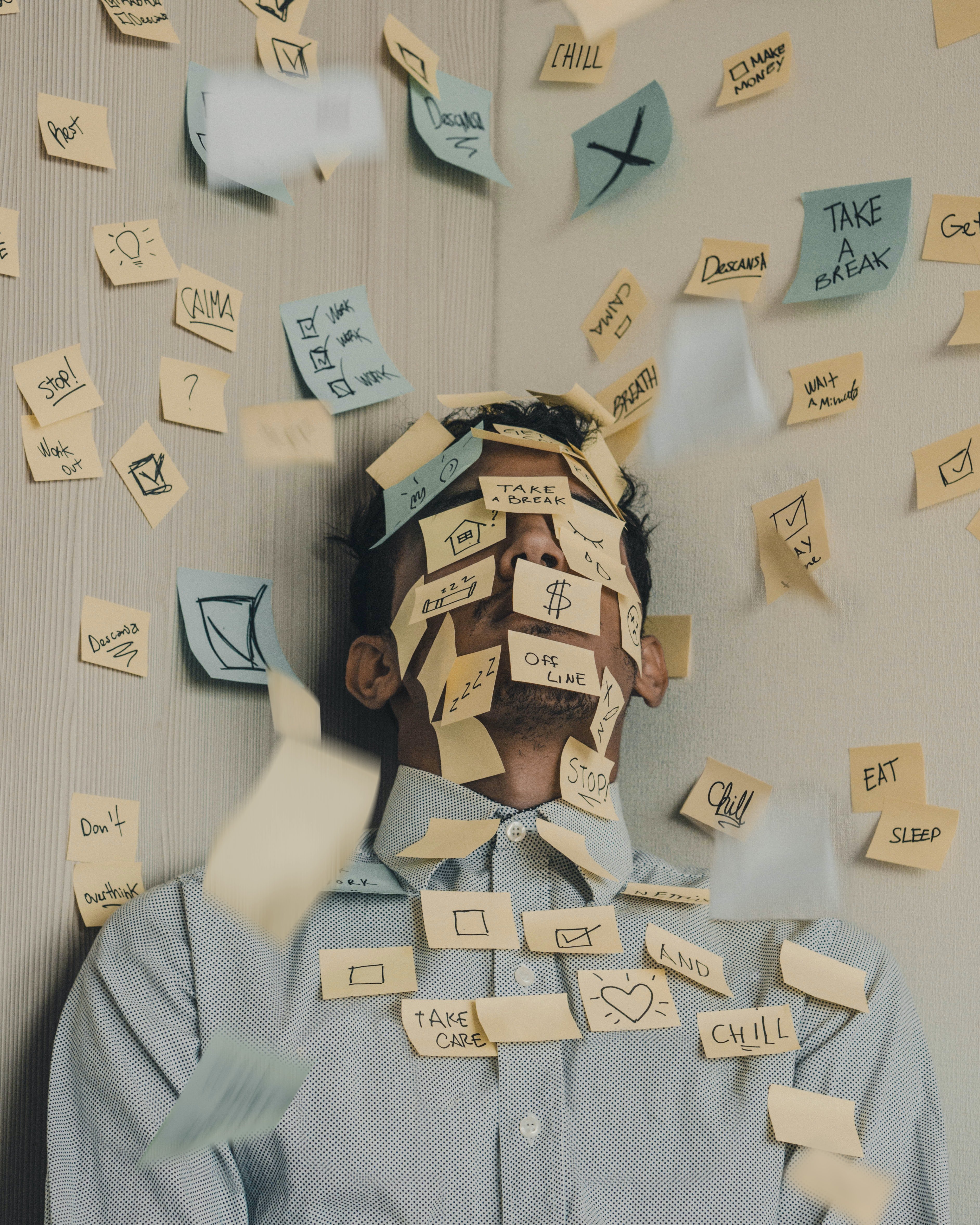 Man covered in Post-It Notes | Unsplash 