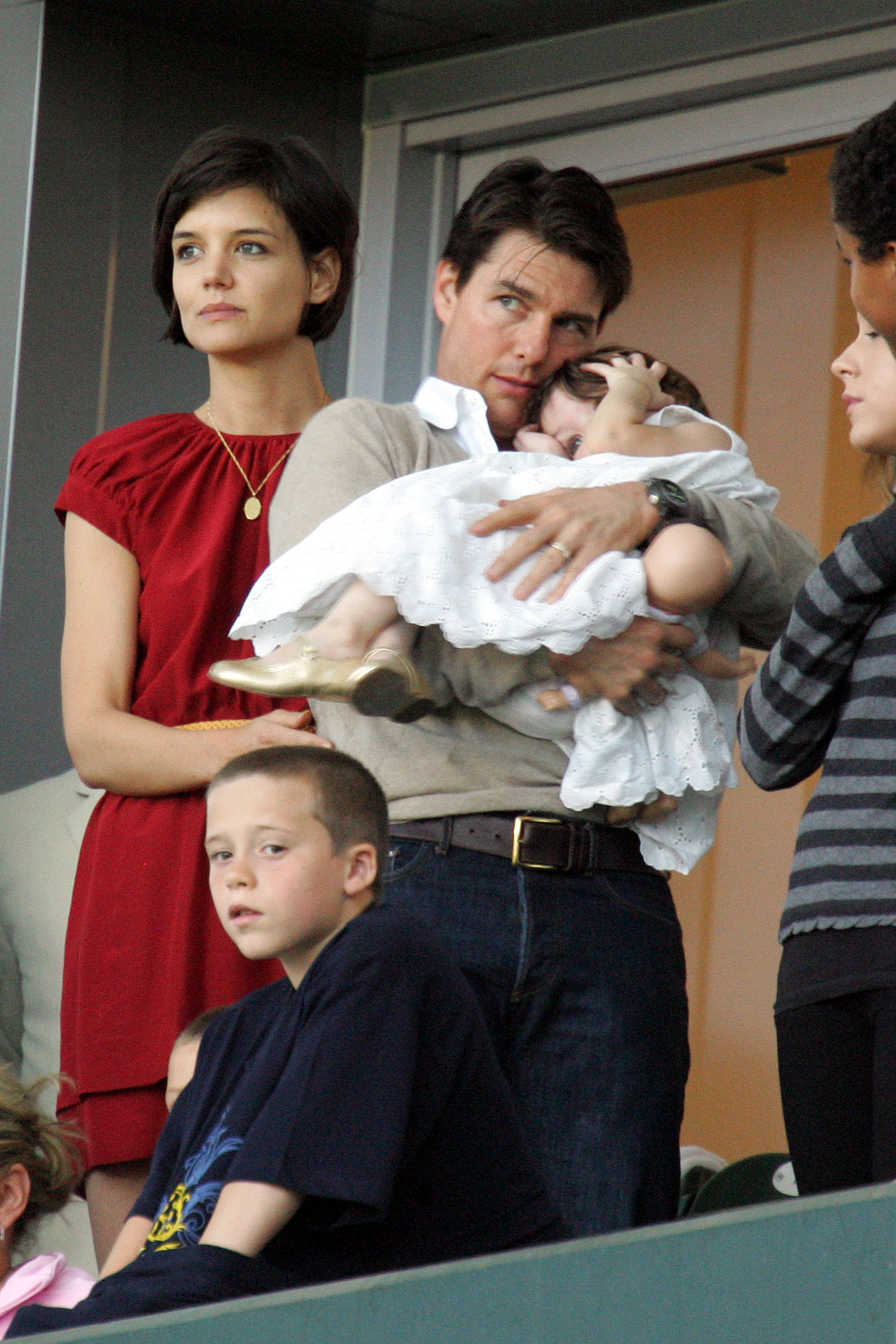 David Beckham's son Brooklyn Beckham (front), actors Tom Cruise and Katie Holmes, with their daughter Suri Cruise, watch the Major League Soccer match between New York Red Bulls and LA Galaxy at the Home Depot Center May 10, 2008 in Carson, California | Source: Getty Images