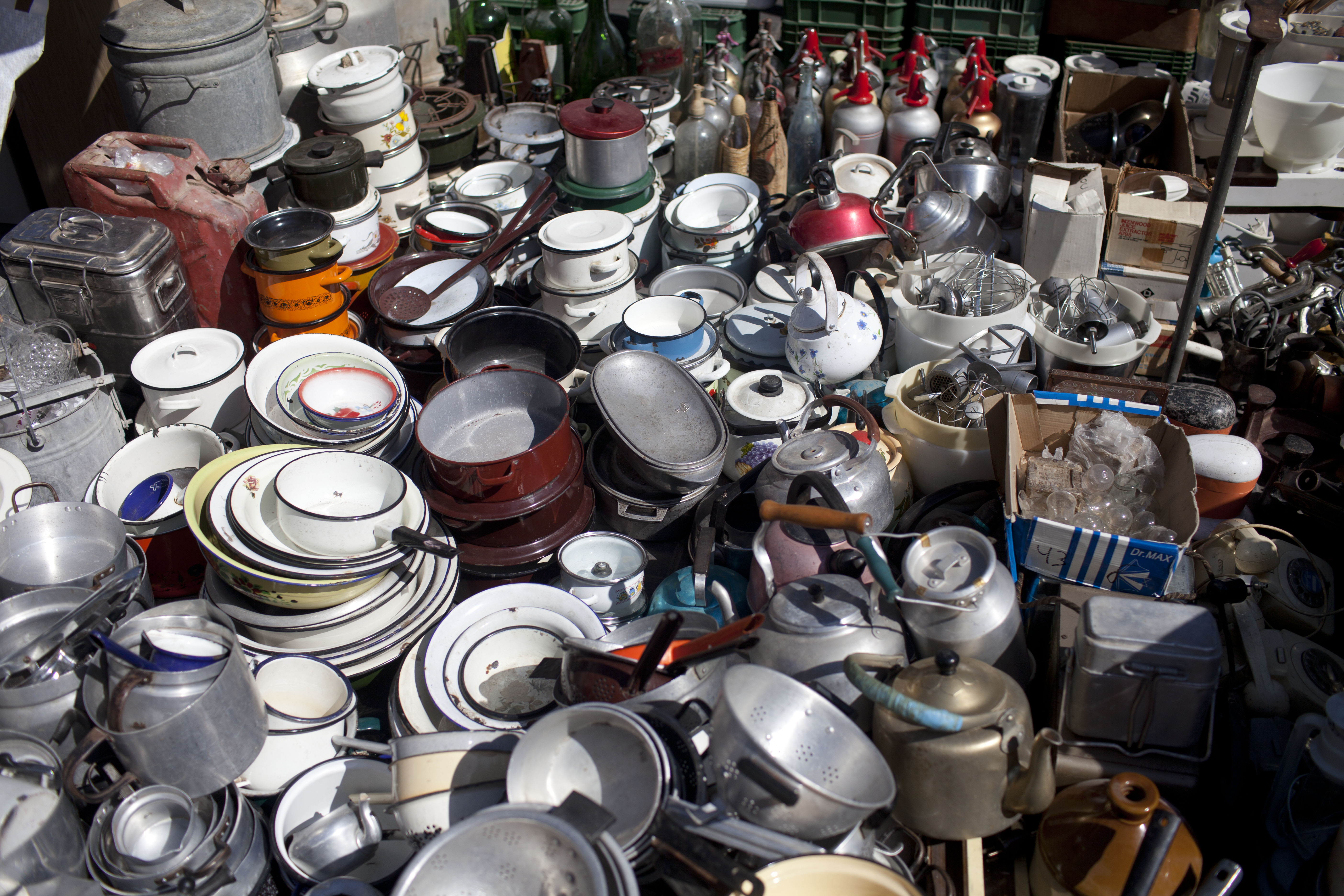 Kitchenware for sale at a flea market | Source: Getty Images