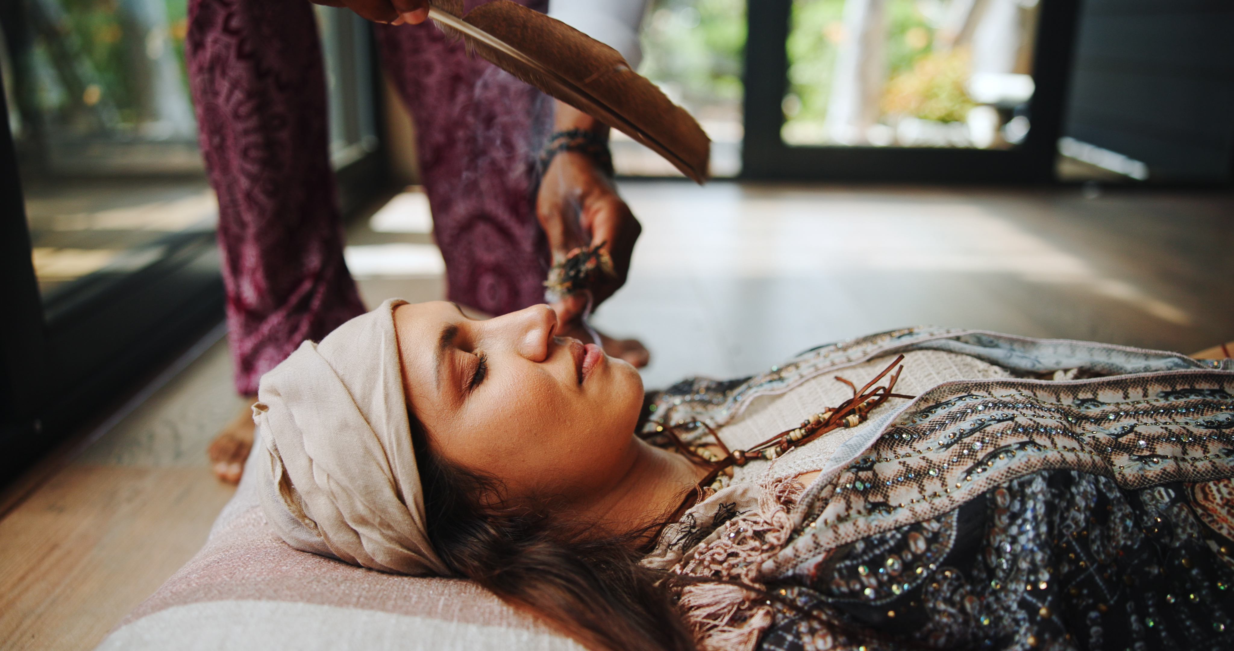 A woman at guided meditation class for mindfulness | Source: Getty Images