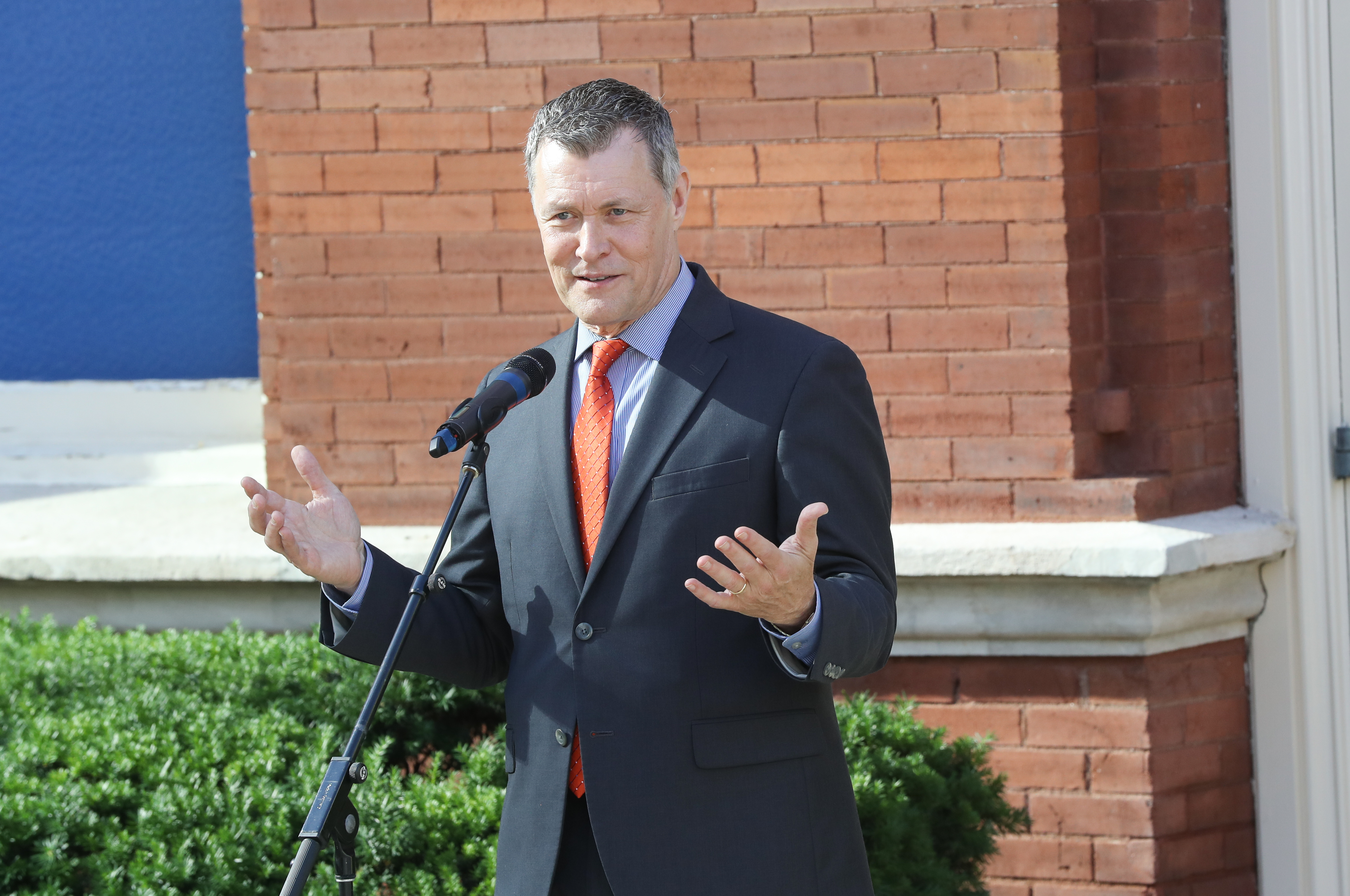Bill Cody speaks during the unveiling of statues honoring Little Jimmy Dickens and Bill Monroe at the Ryman Auditorium on June 7, 2017, in Nashville, Tennessee. | Source: Getty Images