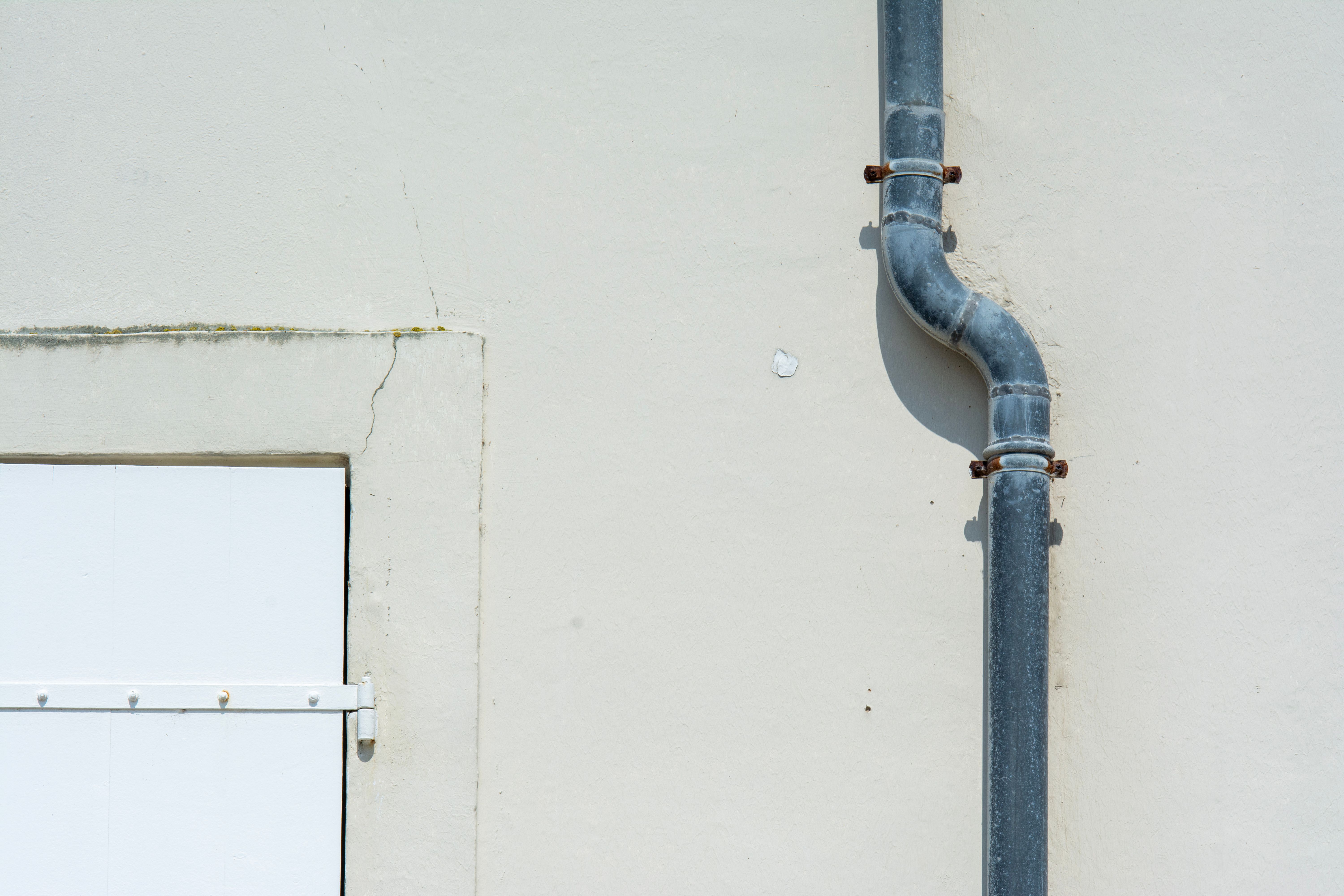 Grey metal drainage pipe | Source: Pexels